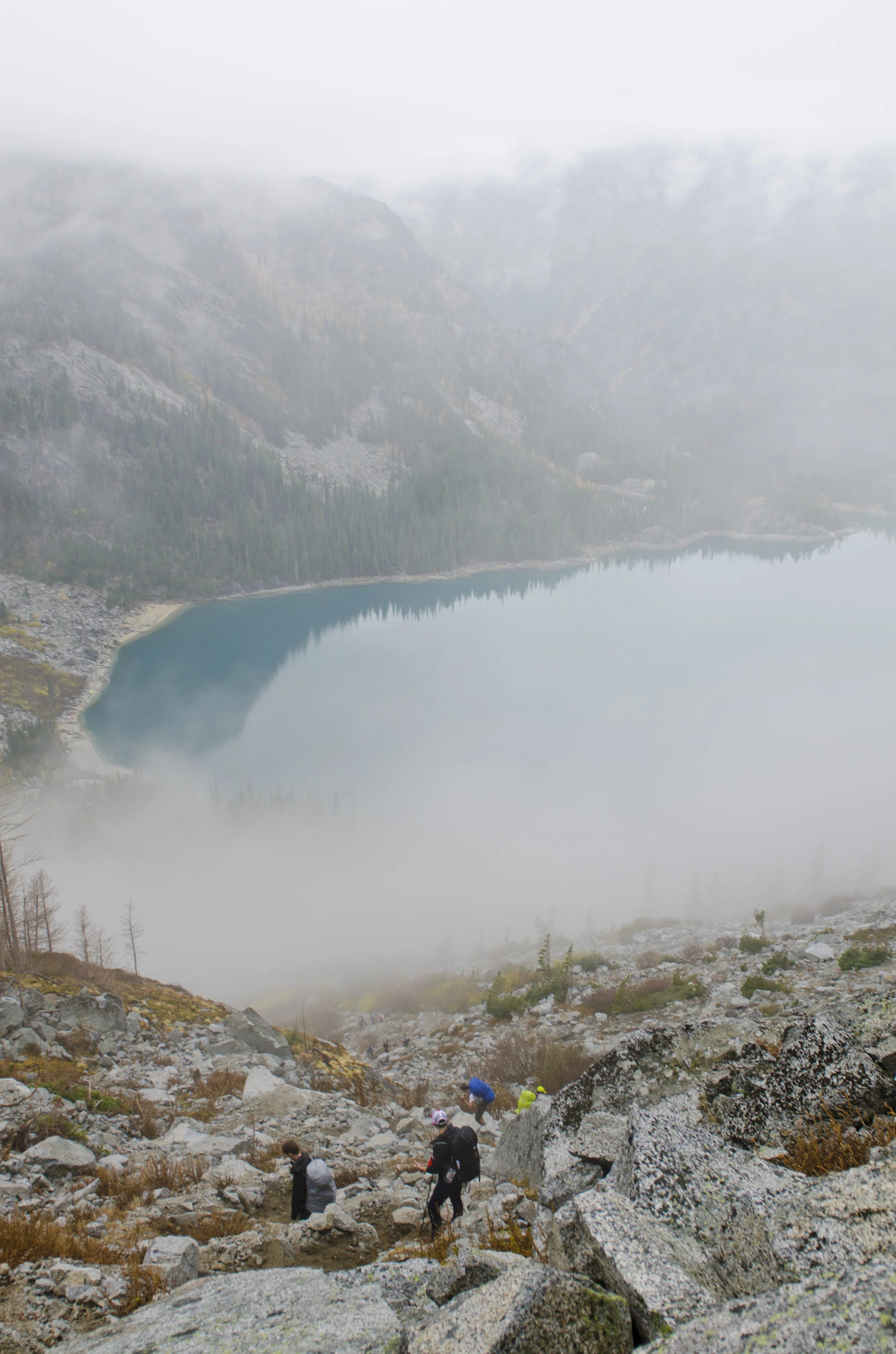 Colchuck peaking out of the fog about halfway down Aasgard