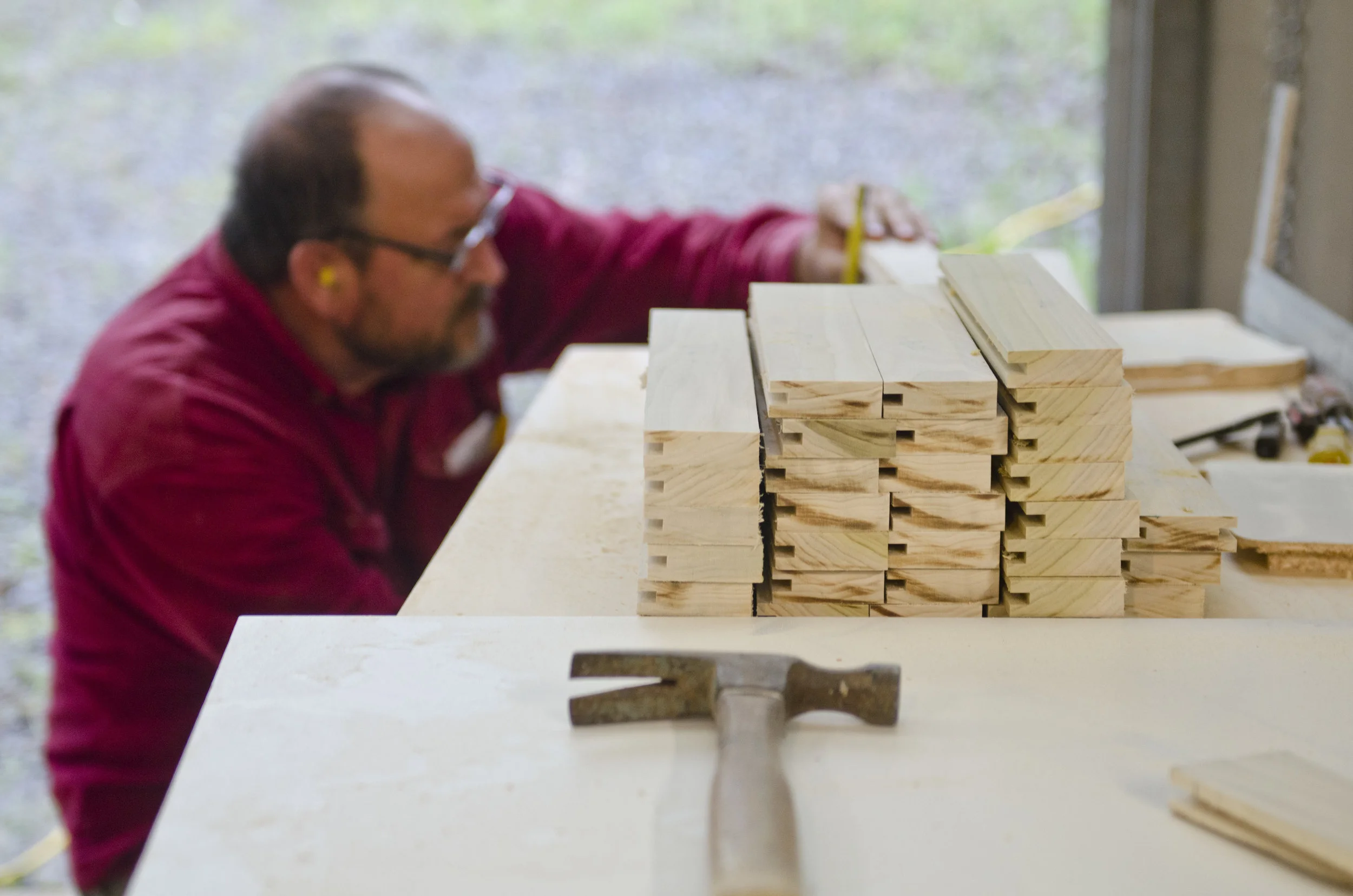 Justin's dad working on our Shaker style cabinet doors