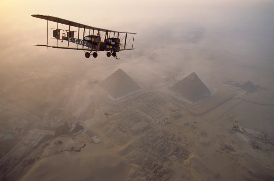 natgeofound:
In the light of early morning, the Vimy circles the pyramids at Giza on a dawn tour, May 1995.Photograph by James L. Stanfield, National Geographic