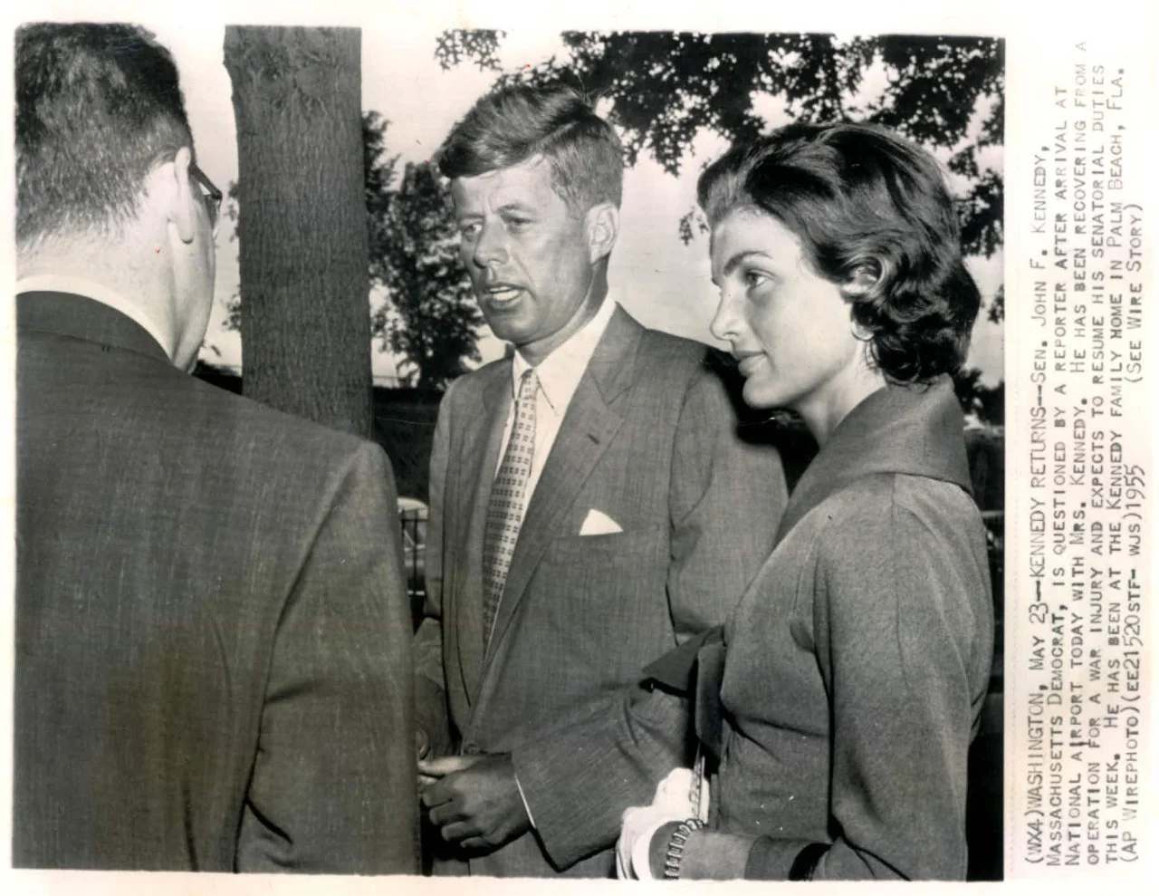 odetojohn:
CAPTION: Washington, May 23 - Kennedy Returns - Sen. John F. Kennedy, Massachusetts Democrat, is questioned by a report after arrival at National Airport today with Mrs. Kennedy. He has been recovering from a operation for a war injury a…