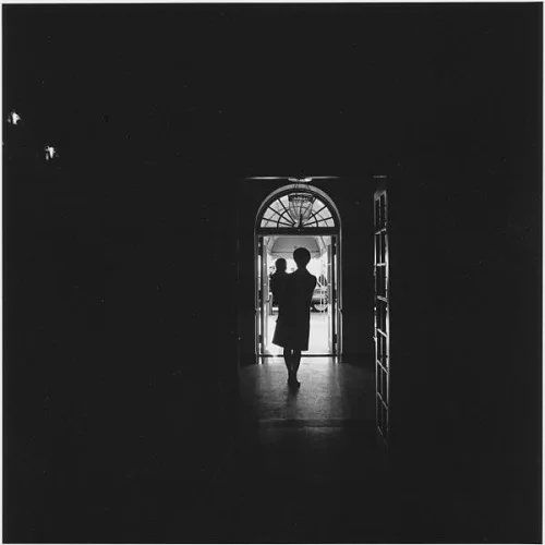 ravenrook2:
Jackie Kennedy and JFK jr.
Cecil Stoughton, Photographer
This is a very cool photo with a wide death of field.  I love the framing of Jackie and JFK jr’s silhouettes in the door and the distance at which the photo was taken so we get th…