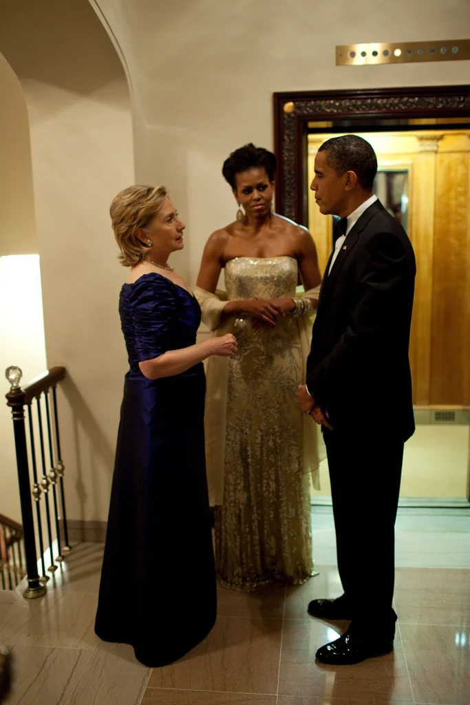 obamafamily:
Secretary of State Hillary Rodham Clinton chats with President Barack Obama and First Lady Michelle Obama prior to the state dinner for Prime Minister Manmohan Singh of India and his wife, Mrs Gursharan Kaur, Nov. 24, 2009. (Official W…