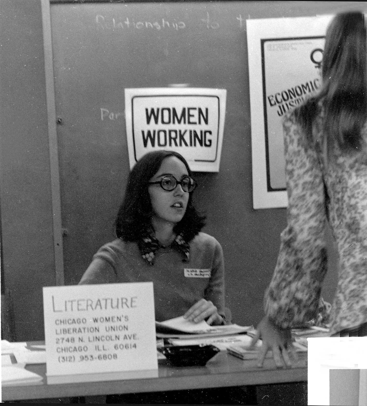 Margaret at CWLU info table