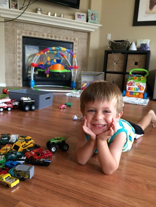 Showing off his car collection