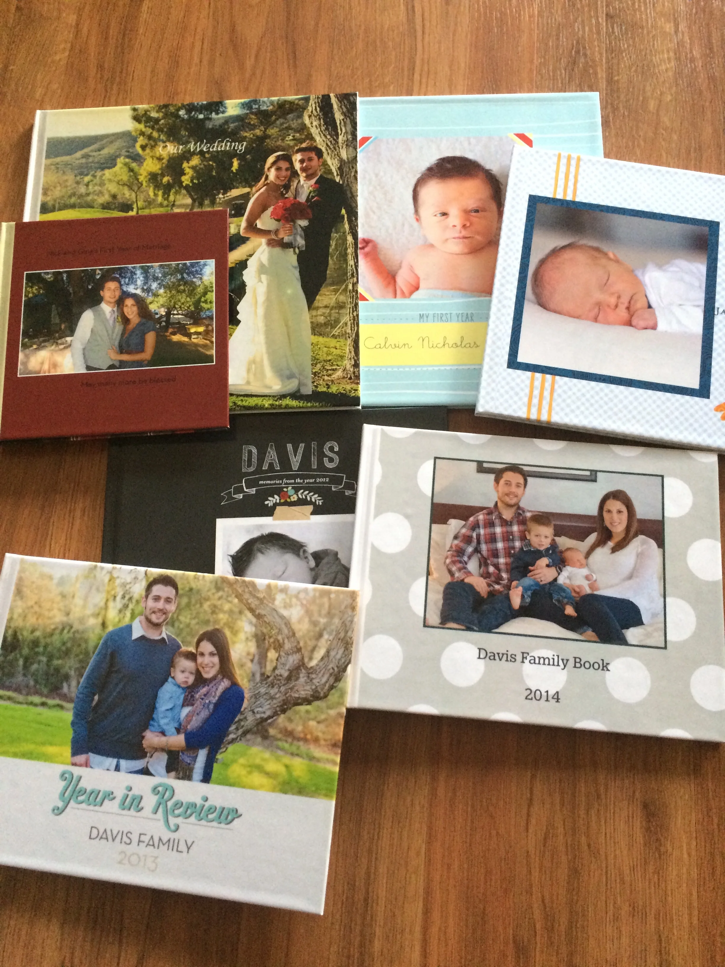 Some of our current books. I have our 2015 Family Book almost ready but am waiting for some good coupons before buying it. 