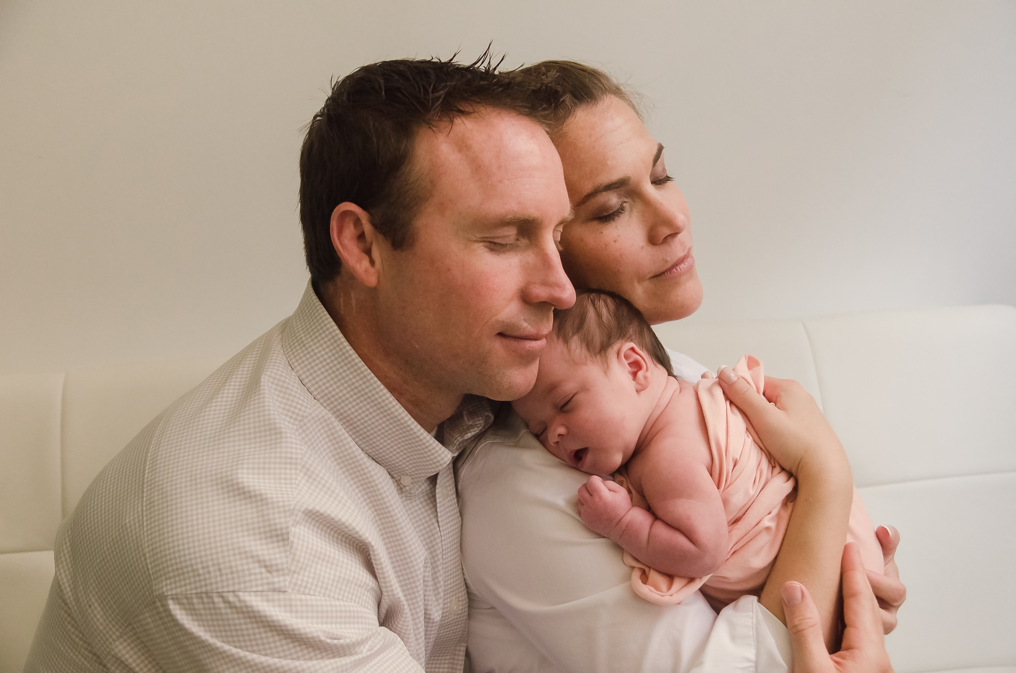 parents snuggling with their newborn baby girl, Indianapolis, IN