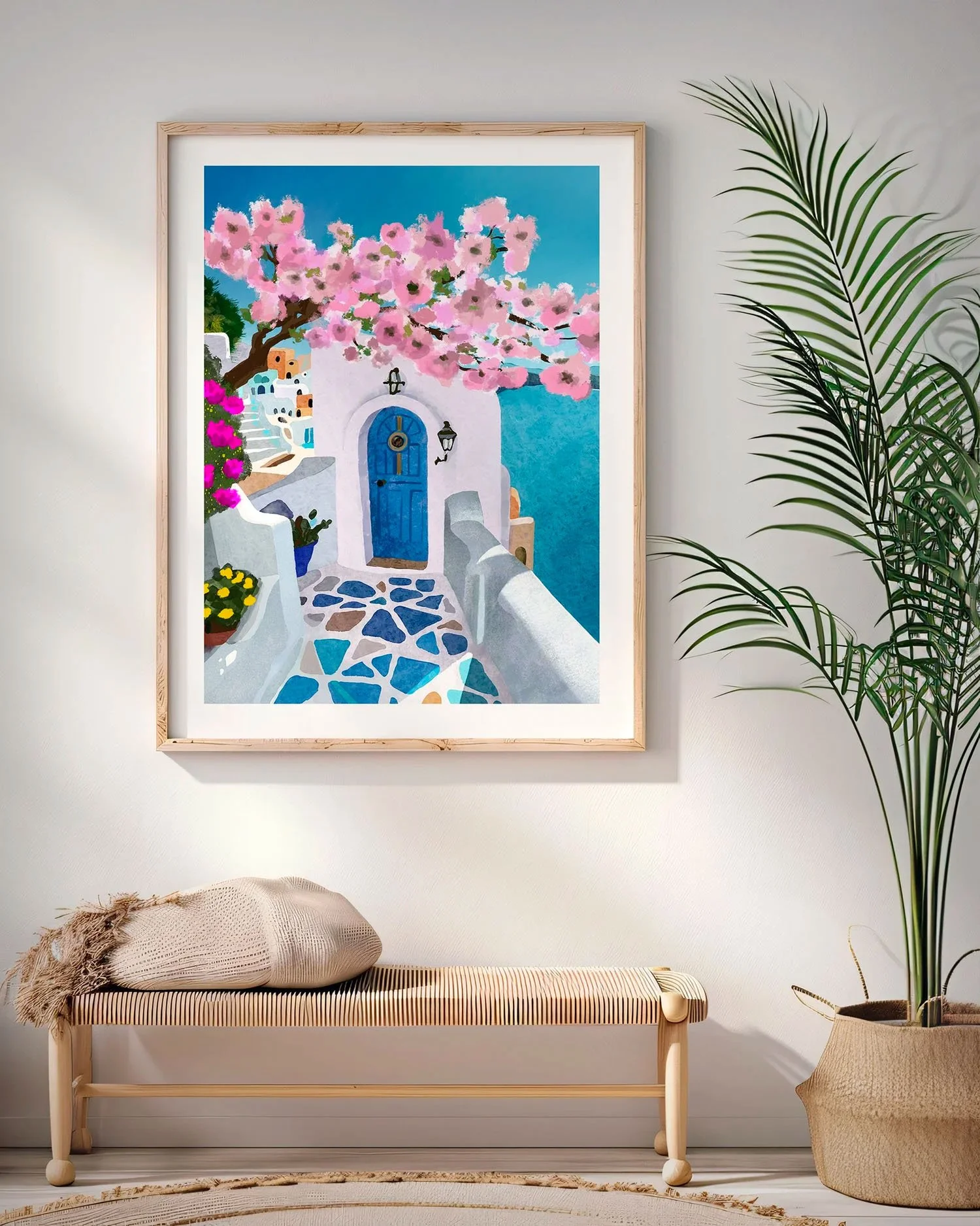 Tirage La Petite Porte Bleue encadré dans une entrée bohème avec banc cannage et palmier
