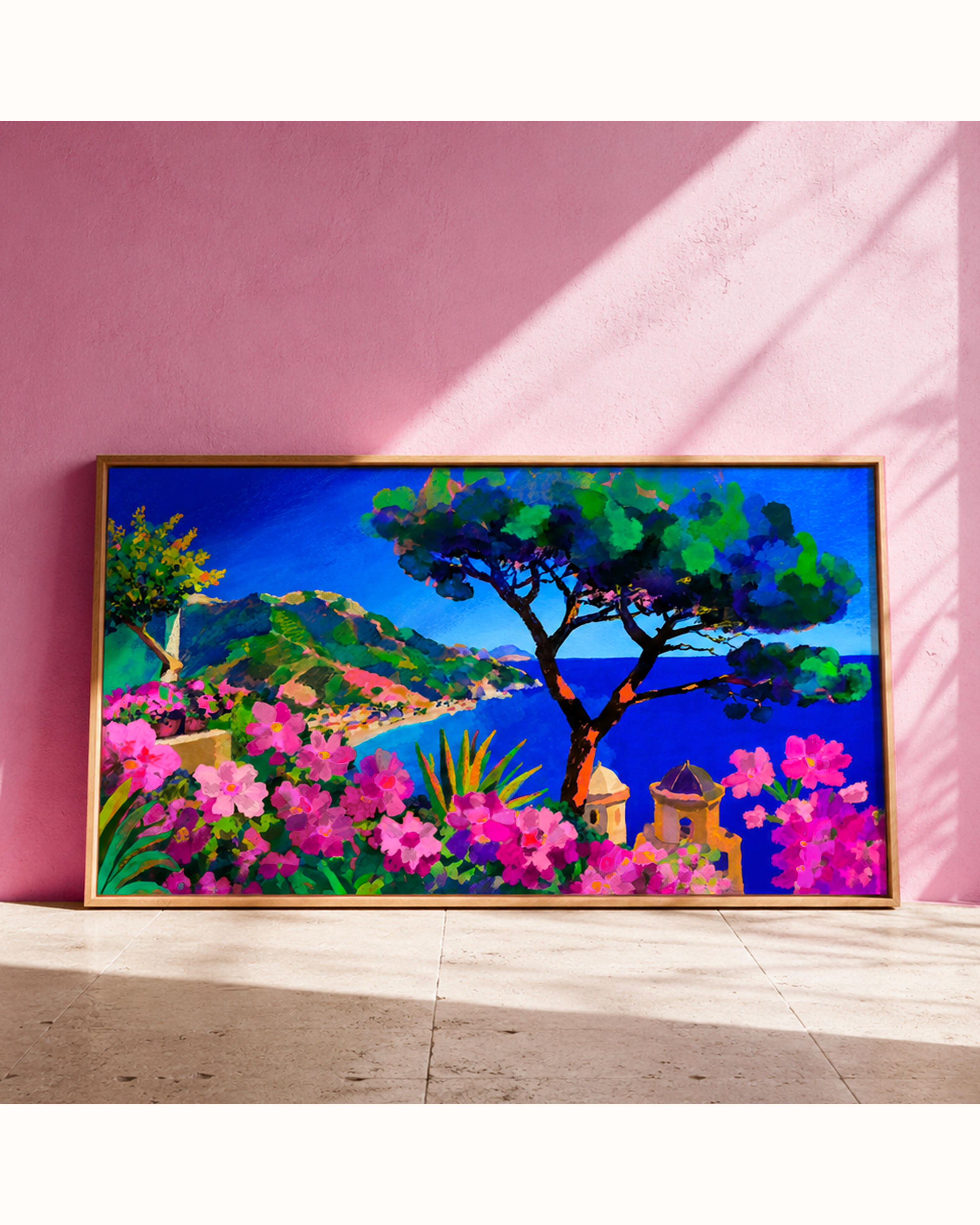 Tirage d'art Ciao Ravello, cadre chêne posé contre un mur rose, affiche côte amalfitaine en édition limitée