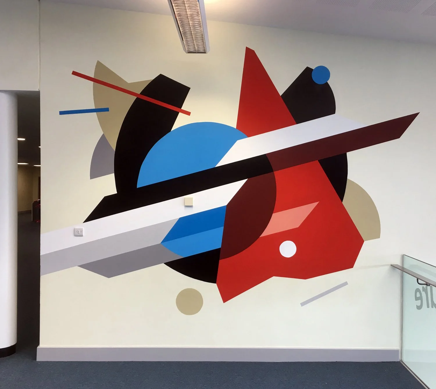  Collage workshop based on the same shapes as a mural created at the school. 