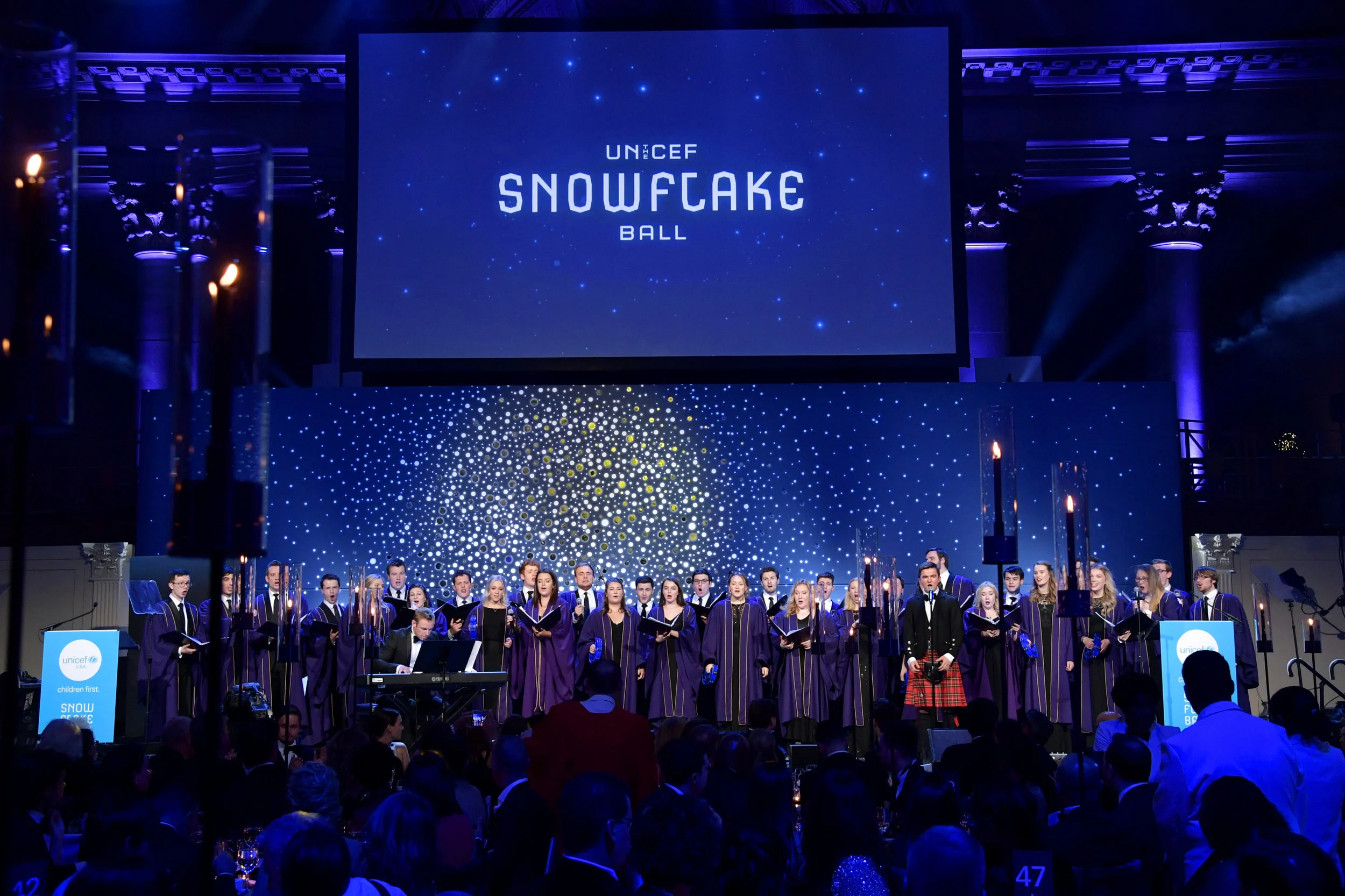 NEW YORK, NY - NOVEMBER 27: University of Aberdeen Choir performs onstage during the 14th Annual UNICEF Snowflake Ball 2018 on November 27, 2018 in New York City. (Photo by Michael Loccisano/Getty Images for UNICEF)