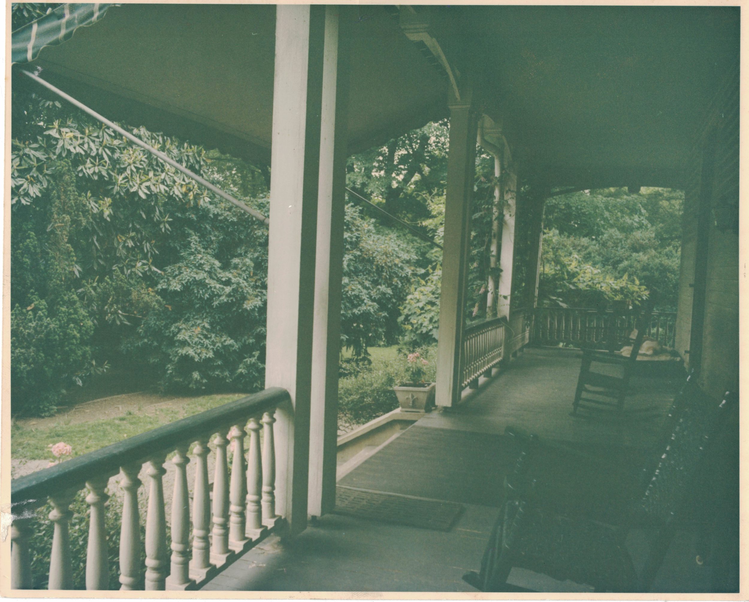 Front porch of Pine Hill Cottage, 1960s. If you look close you can see a dog sleeping in the right-hand corner.