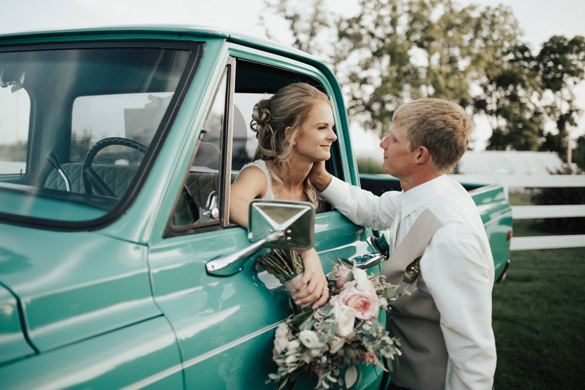 Bride and groom bouquet with vintage truck
