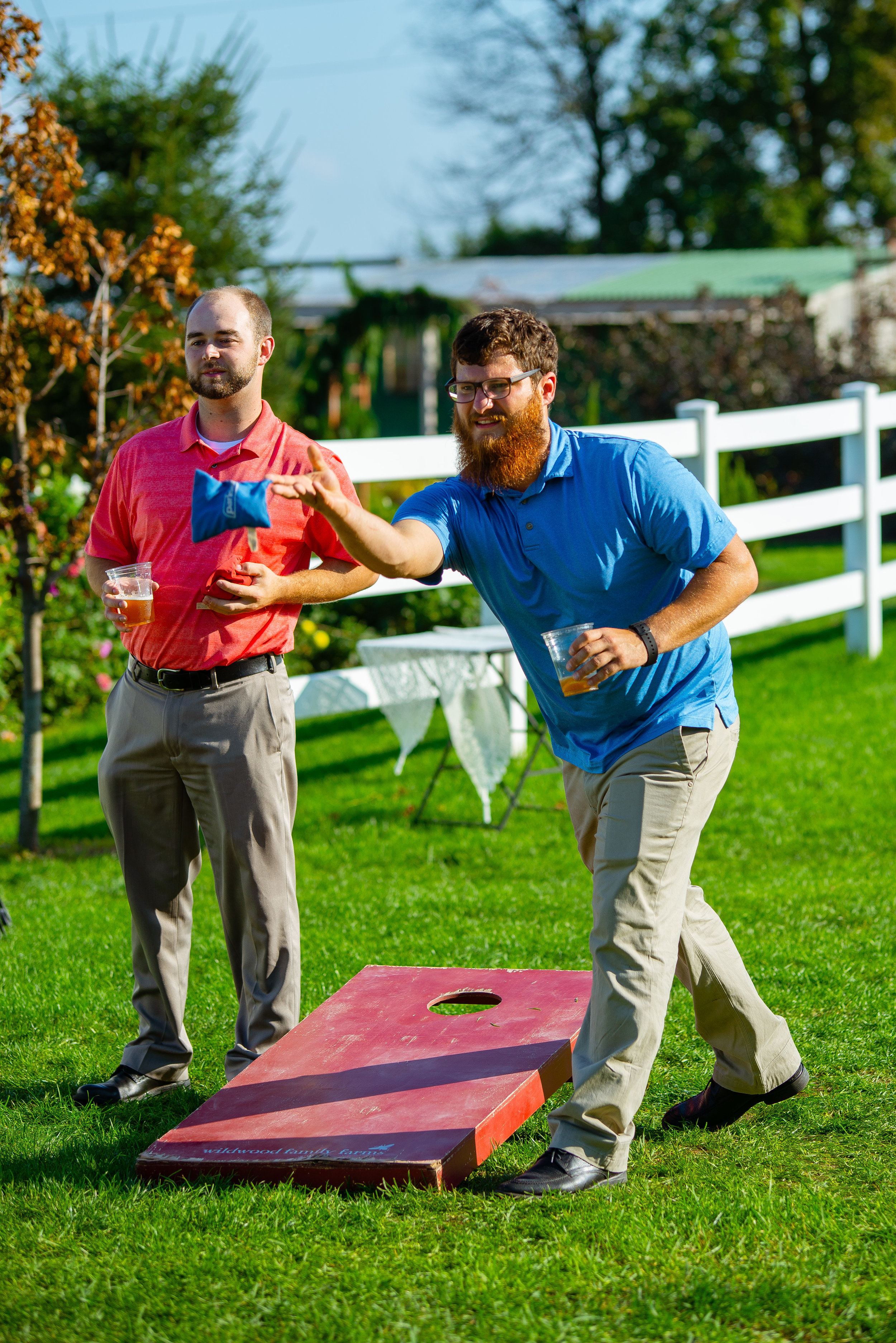 Corn hole yard games during cocktail hour