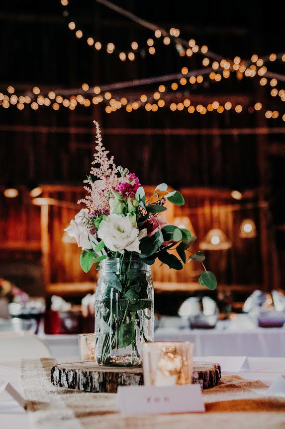 Mason jar centerpiece on table