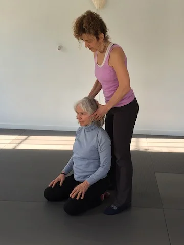 Aging gracefully: Katie helps a student rediscover the natural poise of the head in sitting