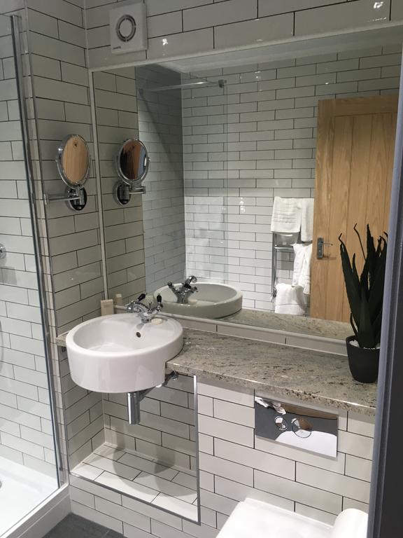 Each of the custom-finished en-suite bathrooms have also been given the design treatment, with contemporary sanitary ware, clean lines and white metro-style tiling.