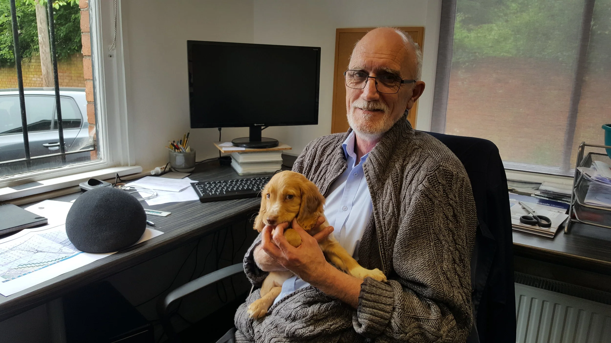 Dave Stidwell, Senior Architectural Technician, C.A.Ross Design - with office dog, Monty!