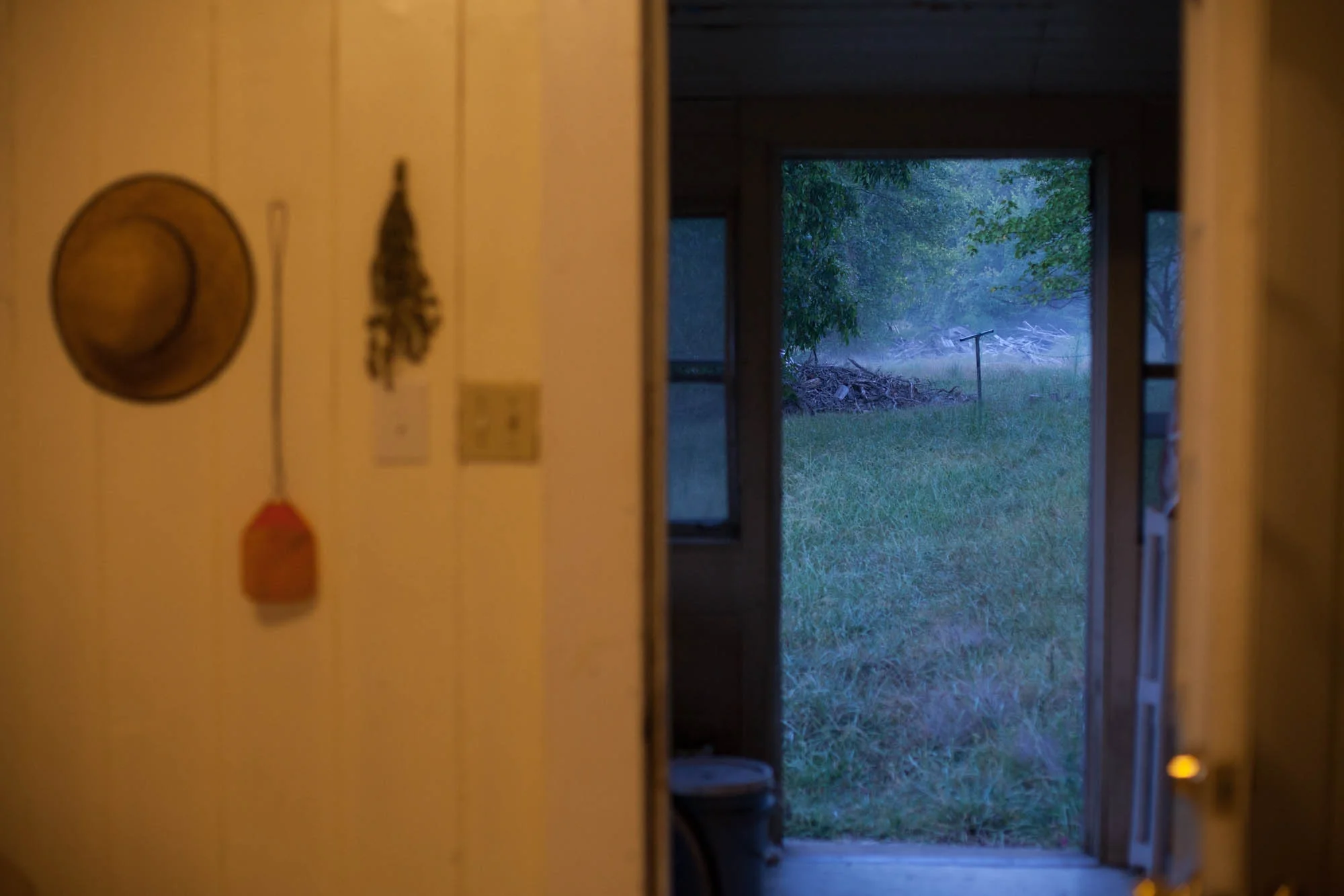 Early morning light through the doorway of intern housing at Funny Girl Farm. Intern housing is located walking distance up the road from the farm itself.