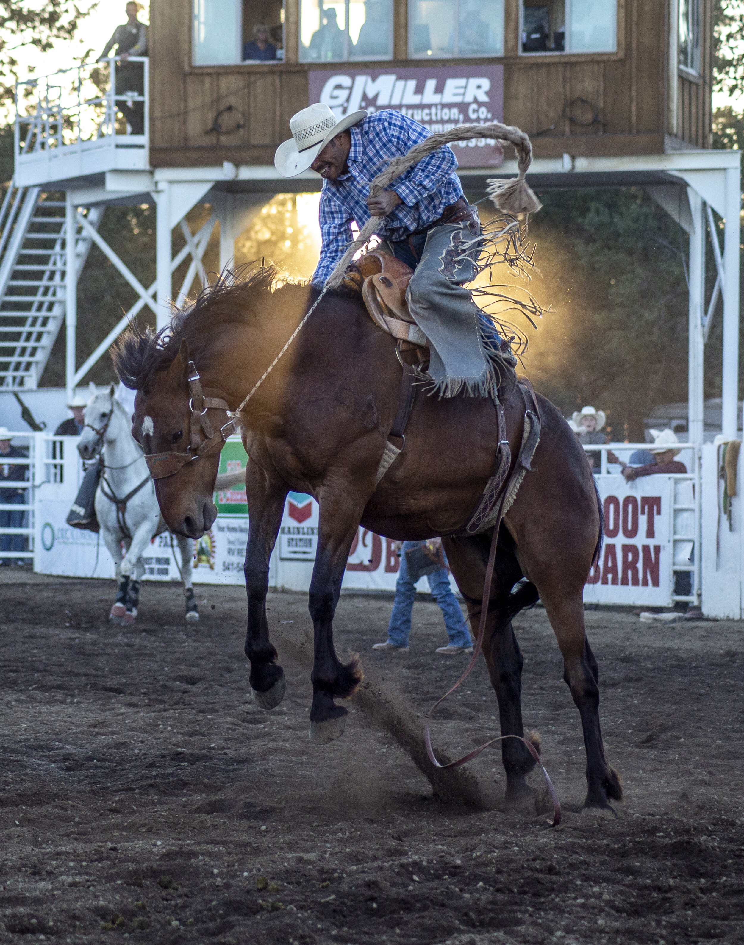 Leon Fountain attempts to impress the judges by hanging on for a full eight seconds during the saddle bronc riding event. The nationally ranked rider failed to place in the Sister’s Rodeo due to a technical disqualification. Saturday, Jun. 8, 2019.