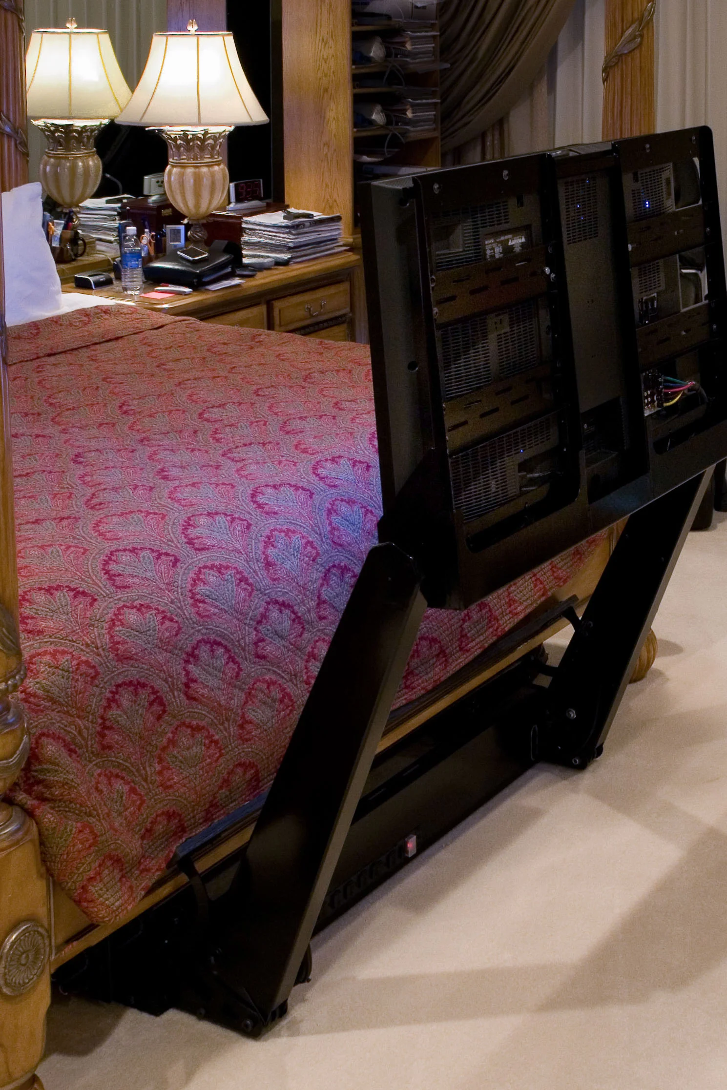 A unique TV storage solution! This TV folds itself up, and puts itself away, with the touch of a button!