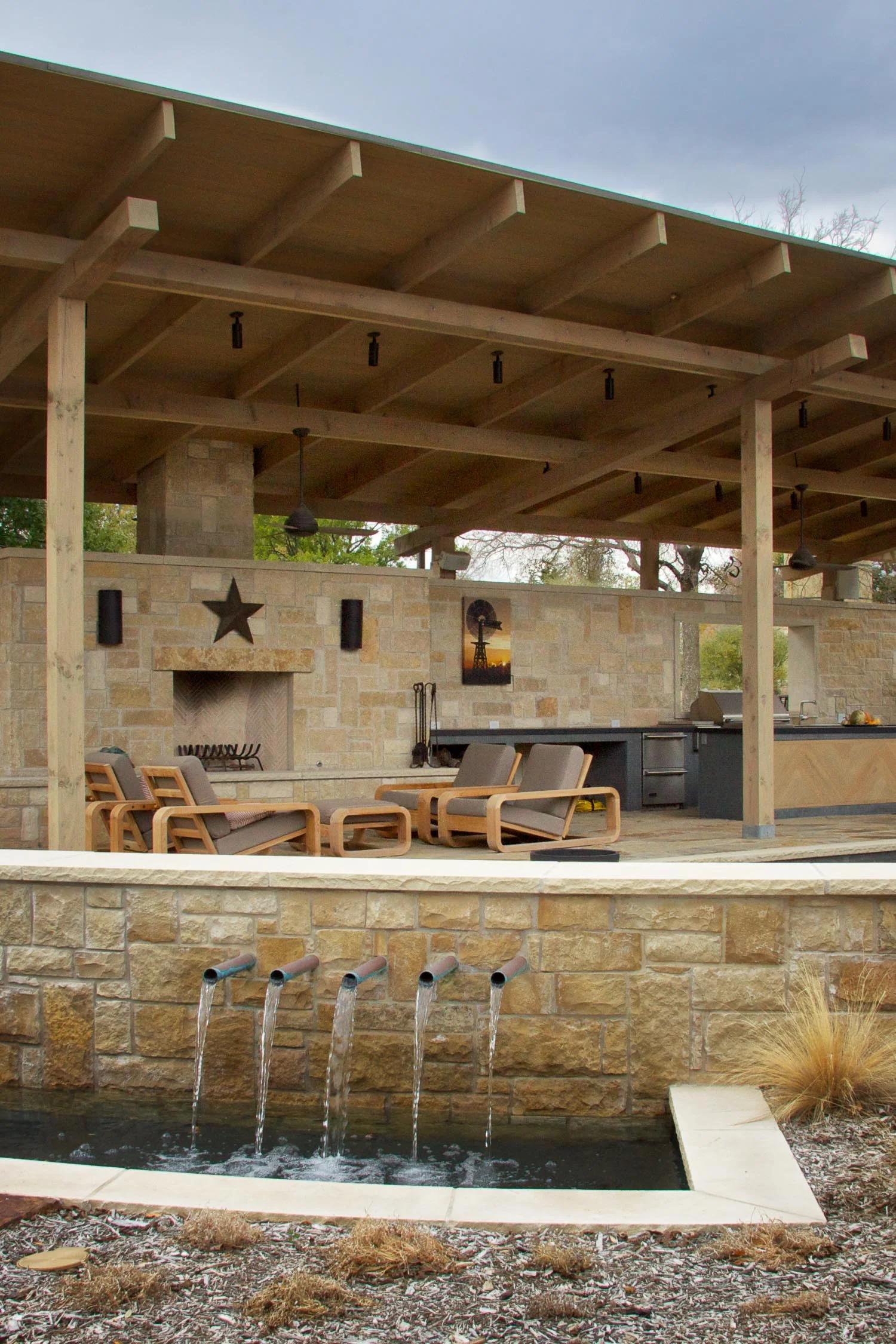 McKinney, Texas Winter view of a year-long project. This Frisco backyard will rival Disney, when it's complete. It's wired for two outdoor TVs. Speakers are placed strategically throughout the yard. The main entertainment area has a Jack Pack, allowing live entertainment to plug in to the whole-home audio system. 