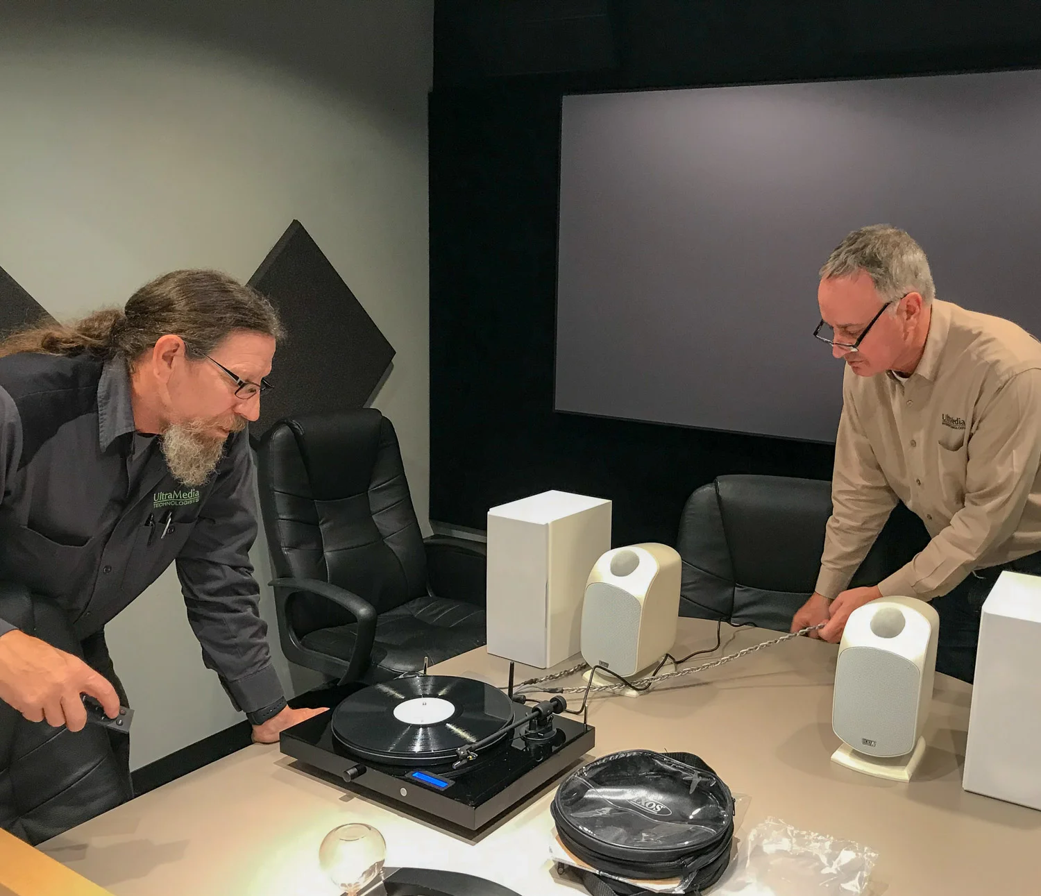 Pat Murray and Pat Johnson set up a new Project turntable for a client. It’s a Christmas present for our client’s daughter. This evening he’ll select a pair of speakers: either B&Ws or Tannoys. Ixos cabling.