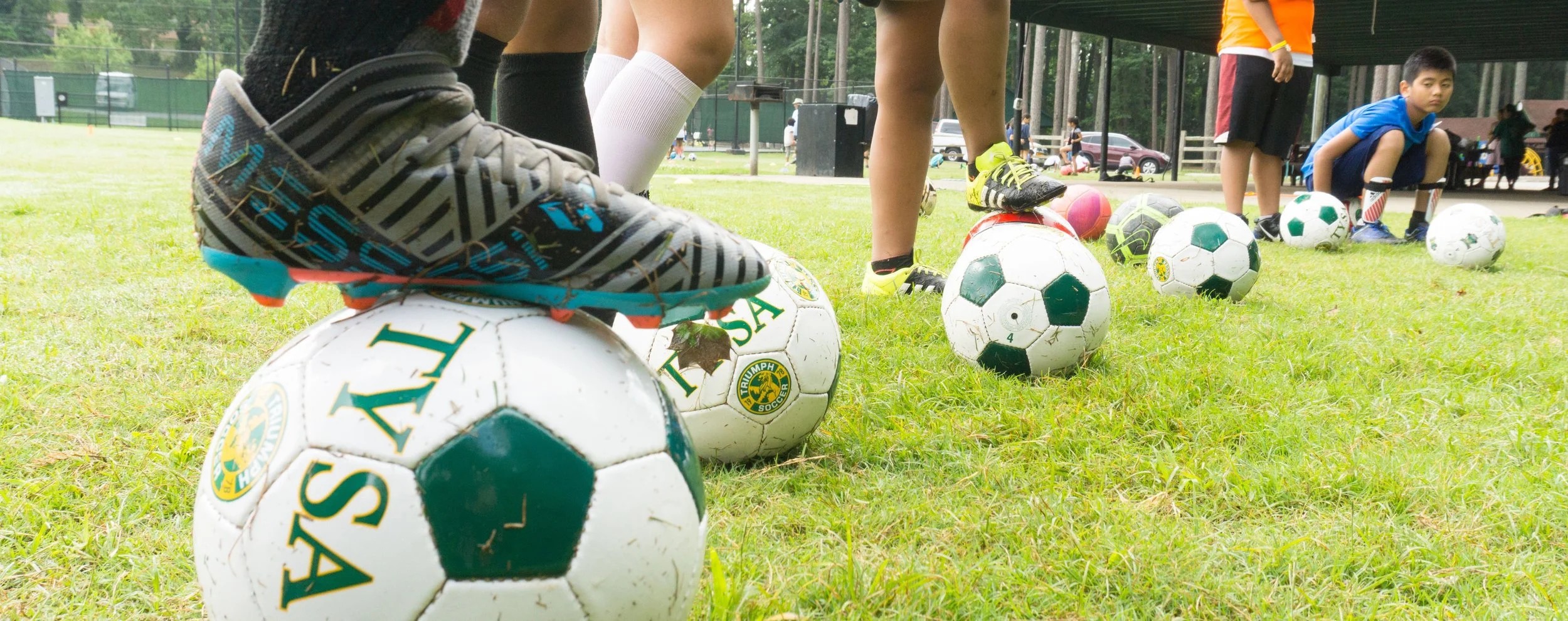 soccer boots on balls 3.96 mb - Copy.jpeg