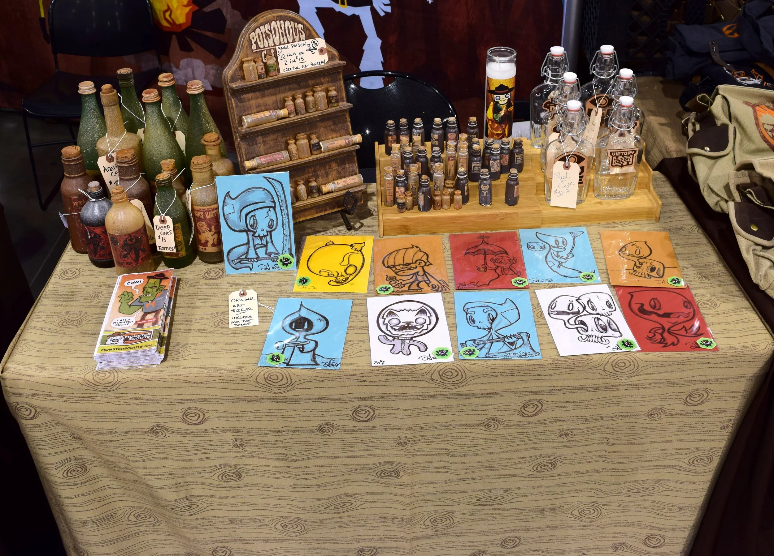 Original art and potion bottles from Steam Crow at Phoenix Comic Con 2017.