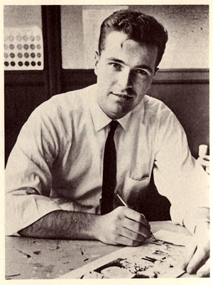 Neal Adams sitting at his drawing table in 1966.