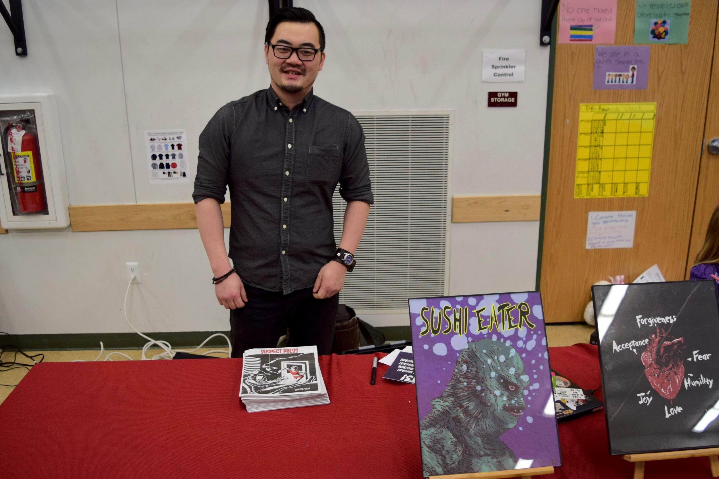 Lonnie Allen with the latest issue of Suspect Press .