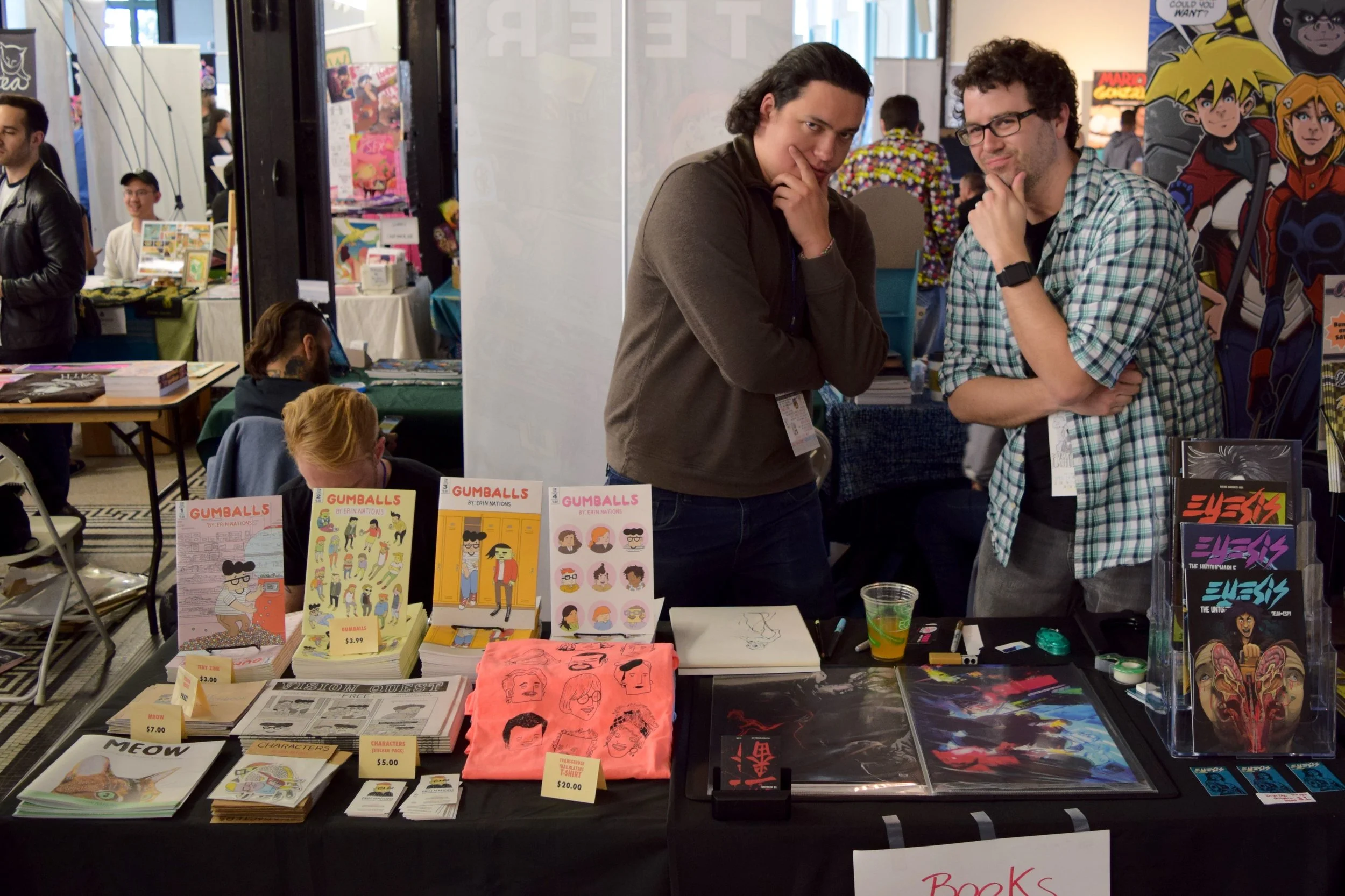 Erin Nations hides while David Espy & Alex Delia pose at DINK 2018.