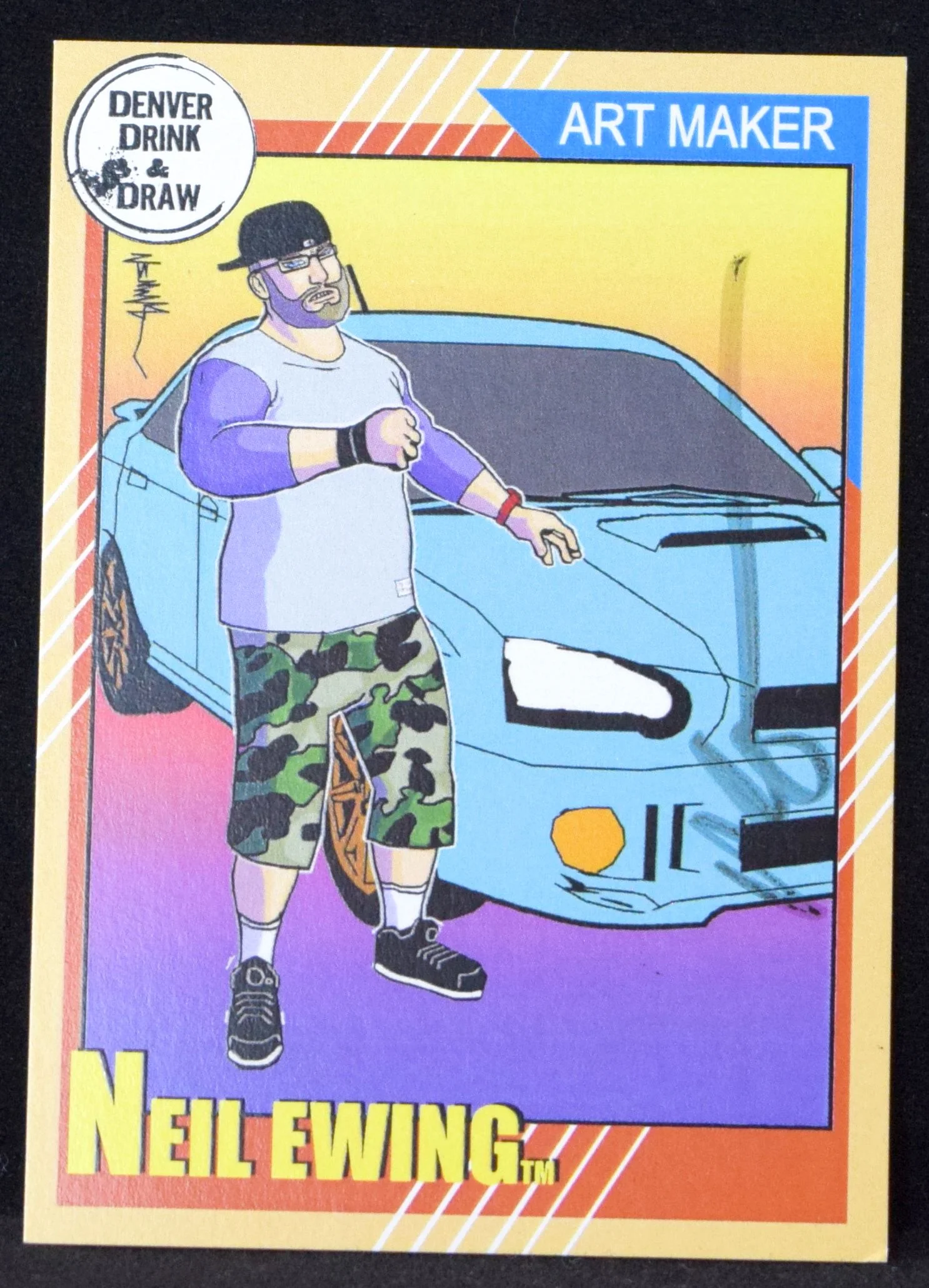 Neil Ewing's trading card stand's in for an actual photo of the man.