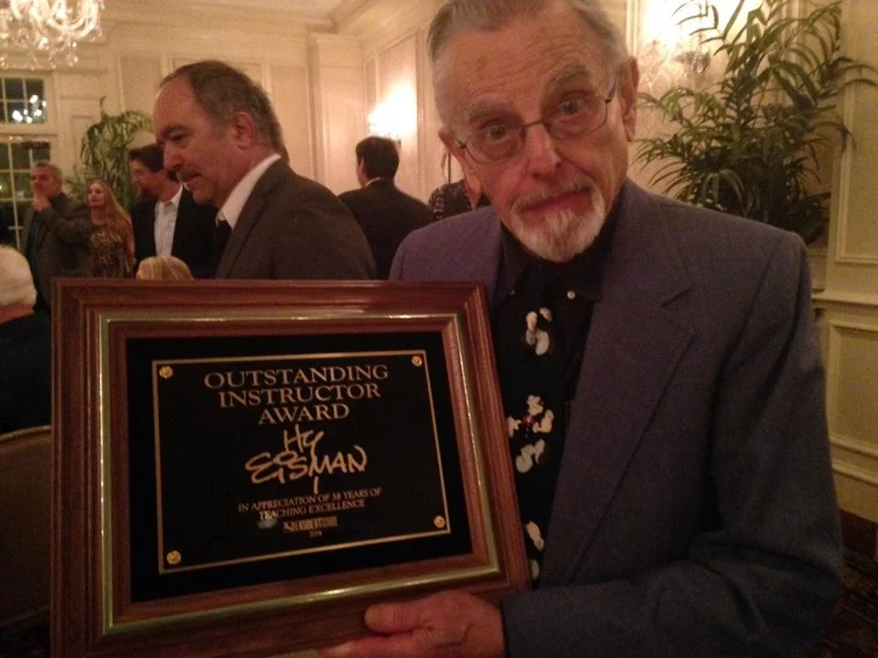 Hy Eisman recieving the Outstanding Instructor Award from the Kubert School - in recognition of his 38 years teaching.