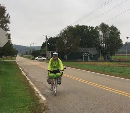 Glad for my newly purchased neon green jacket...makes me visible on a gray day and is keeping me warm. Temps are in low 50 degrees.