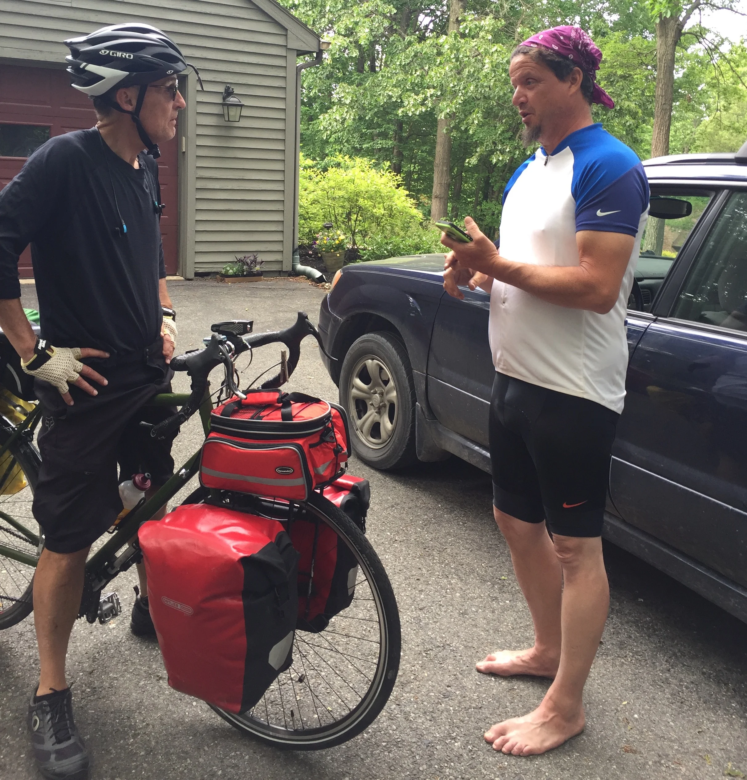 Dave and Shawn sharing biking stories. Dave assuring Shawn he WAS a knight in shining armor!
