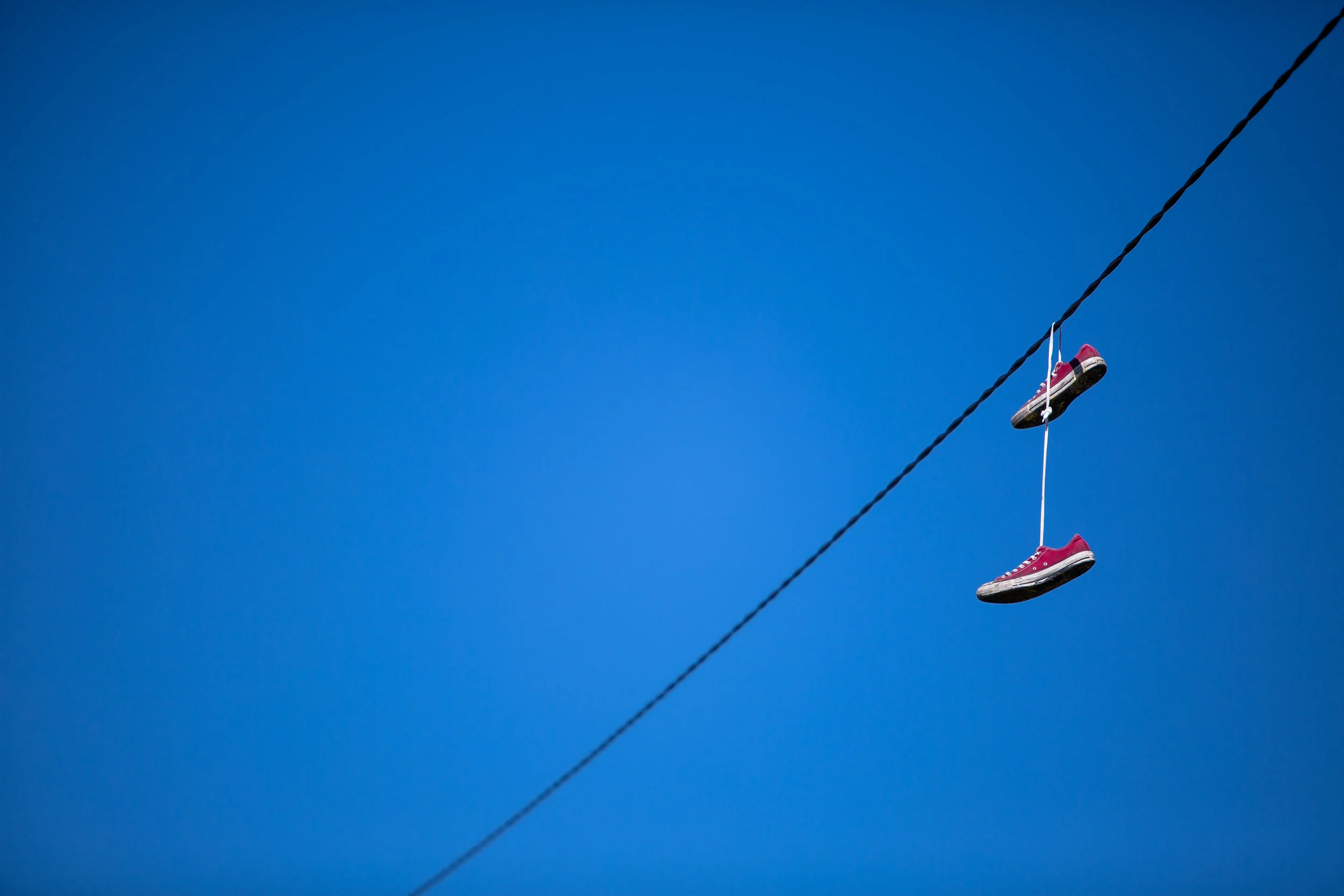 Shoes dangling from a power line 2017
