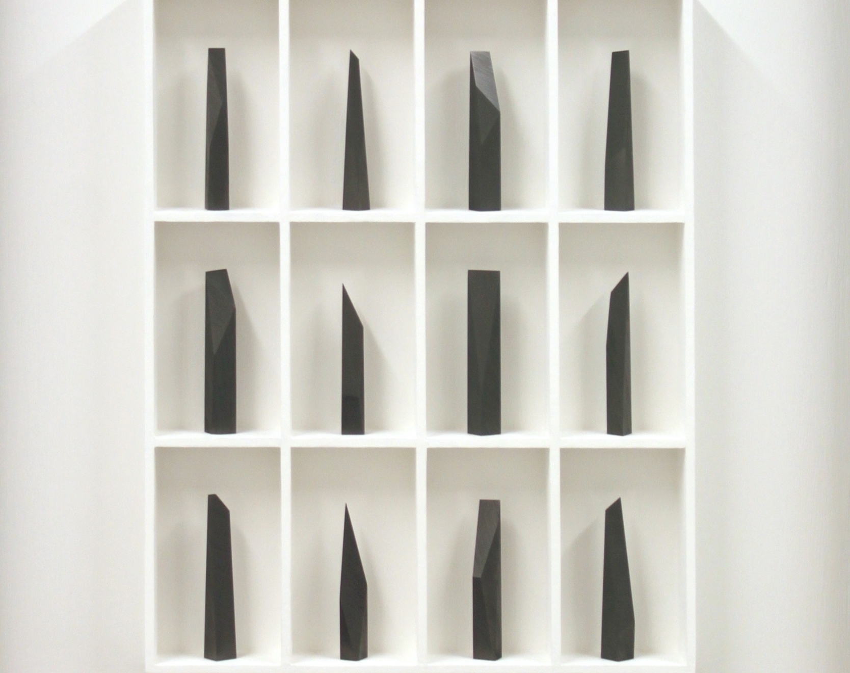 12 continuous lines 60x7x77 cm 12 pieces of graphite in wood construction .jpg