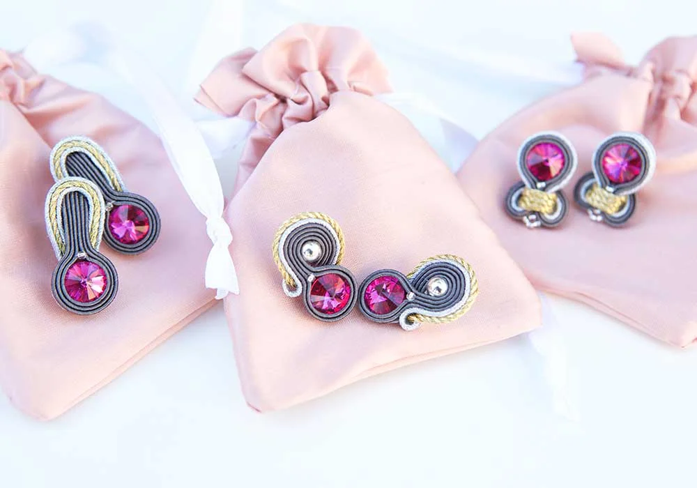 Unique earrings for each bridesmaid were created for this wedding.
