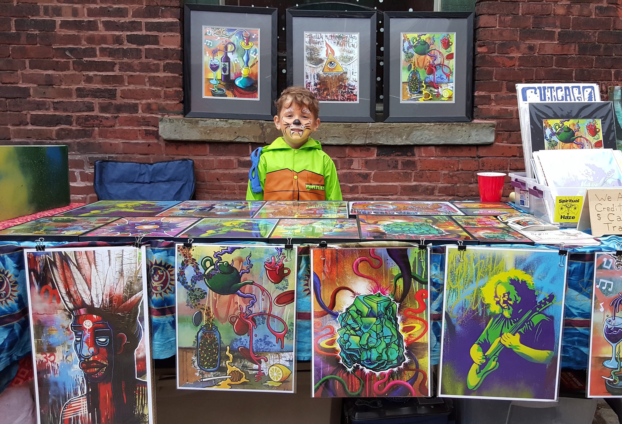 My son Rocko holding down the vendor table.
