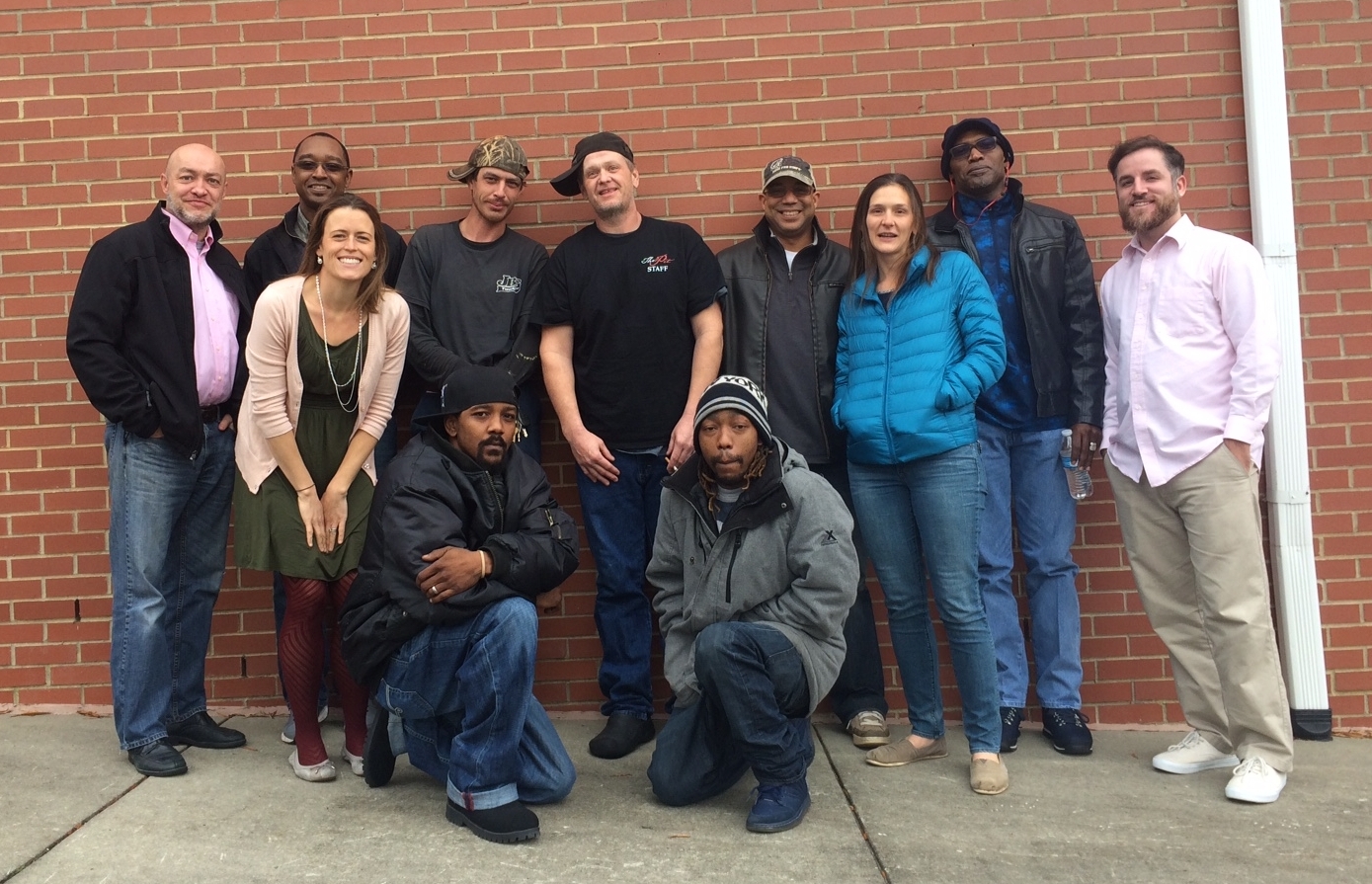 Graduates, Facilitator-in-Training, and two Strong Fathers staff members