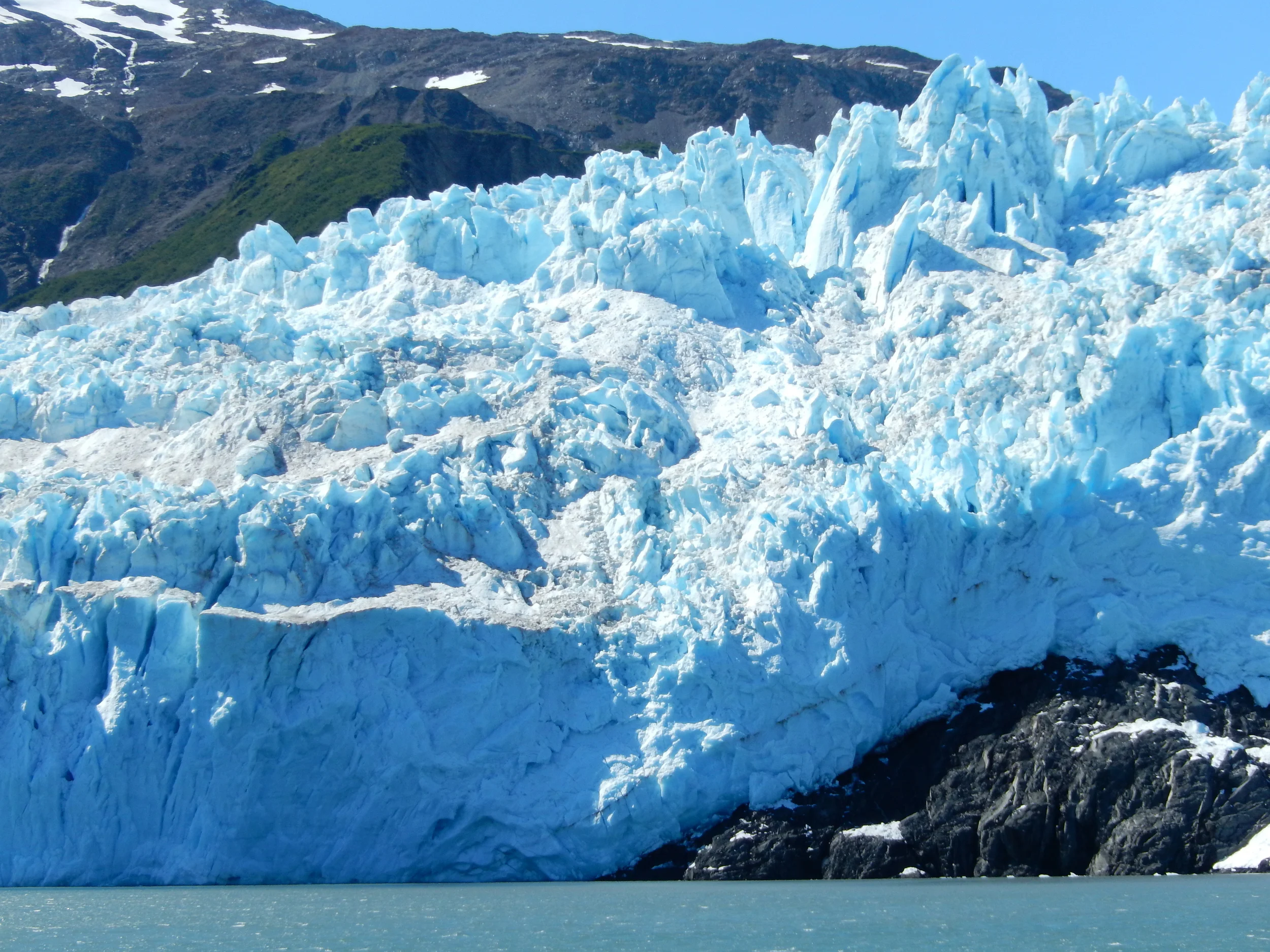 AIALIK glacier in the Kenai Fjords. again, future landscape is peaking out under the ice. history waiting to happen