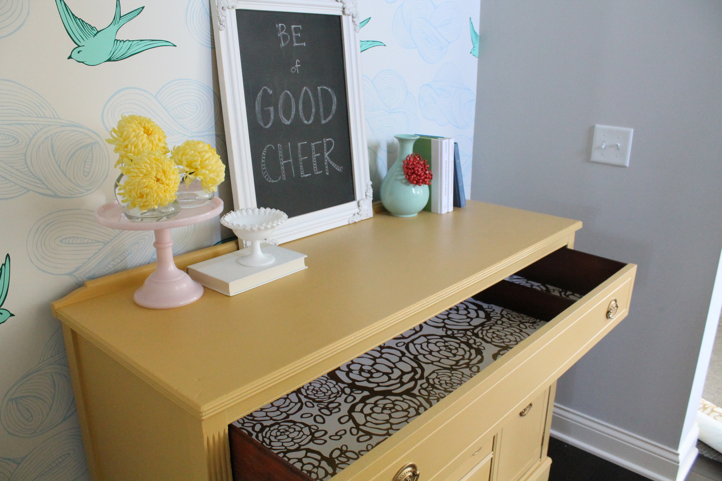 Yellow Sideboard with wallpapered drawers