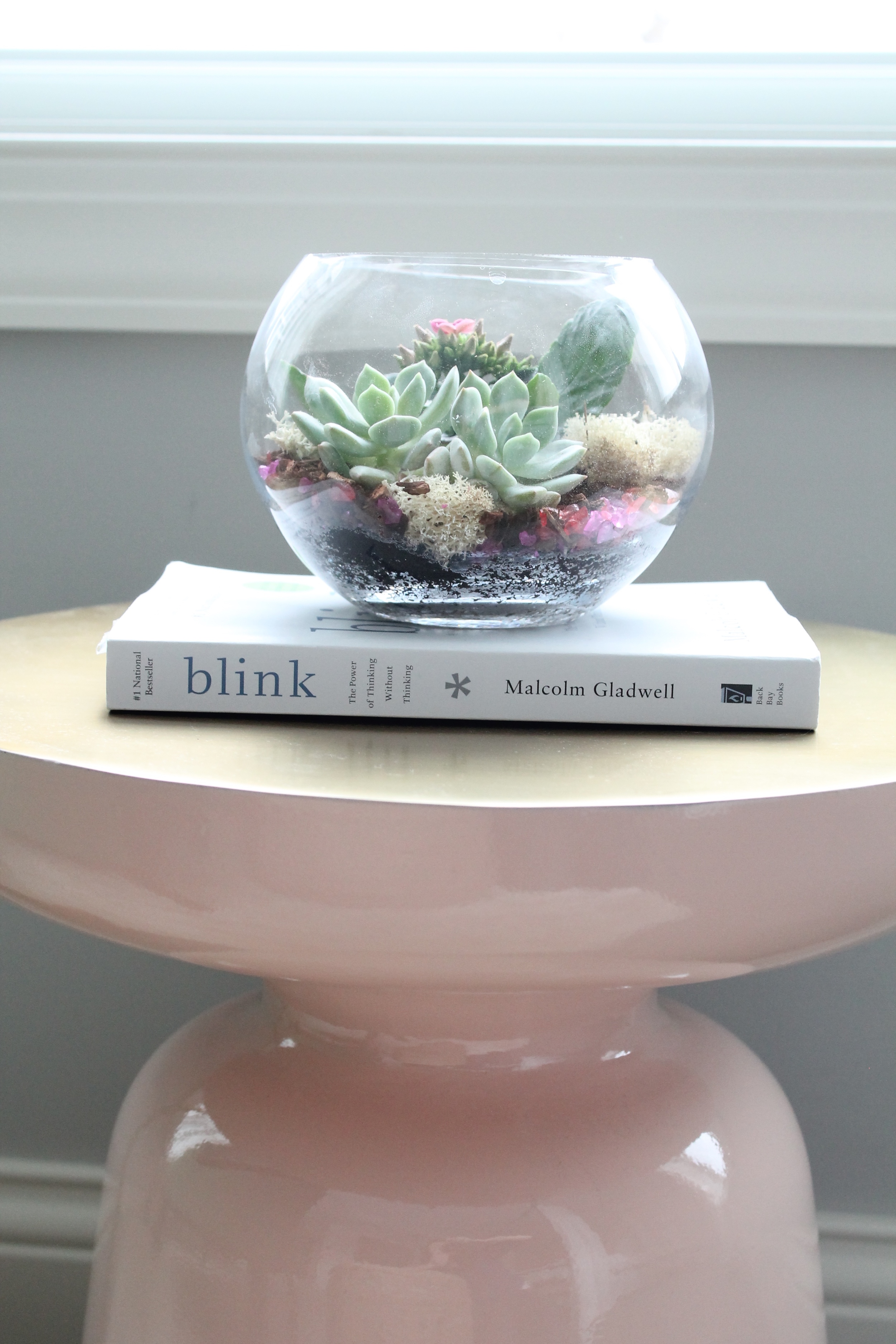 Pink and gold side table/martini table from West Elm. So lovely with the succulents on top.