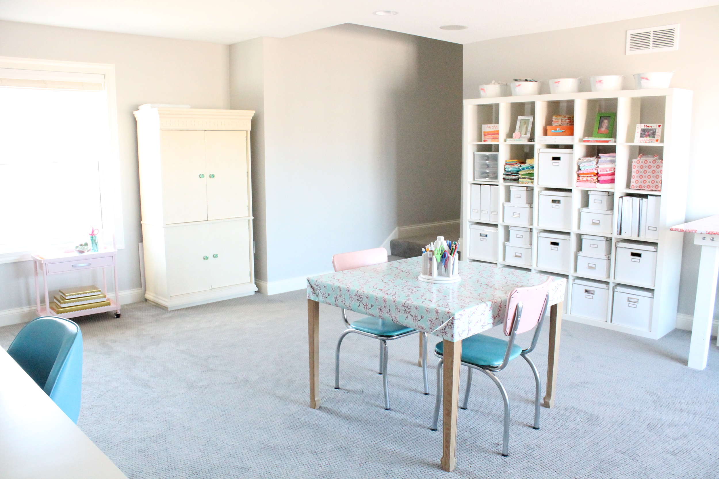 Family Craft Studio. Love how everyone in the family can share this creative space. A perfect craft room for sewing, scrapbooking, wrapping presents or just reading a book.