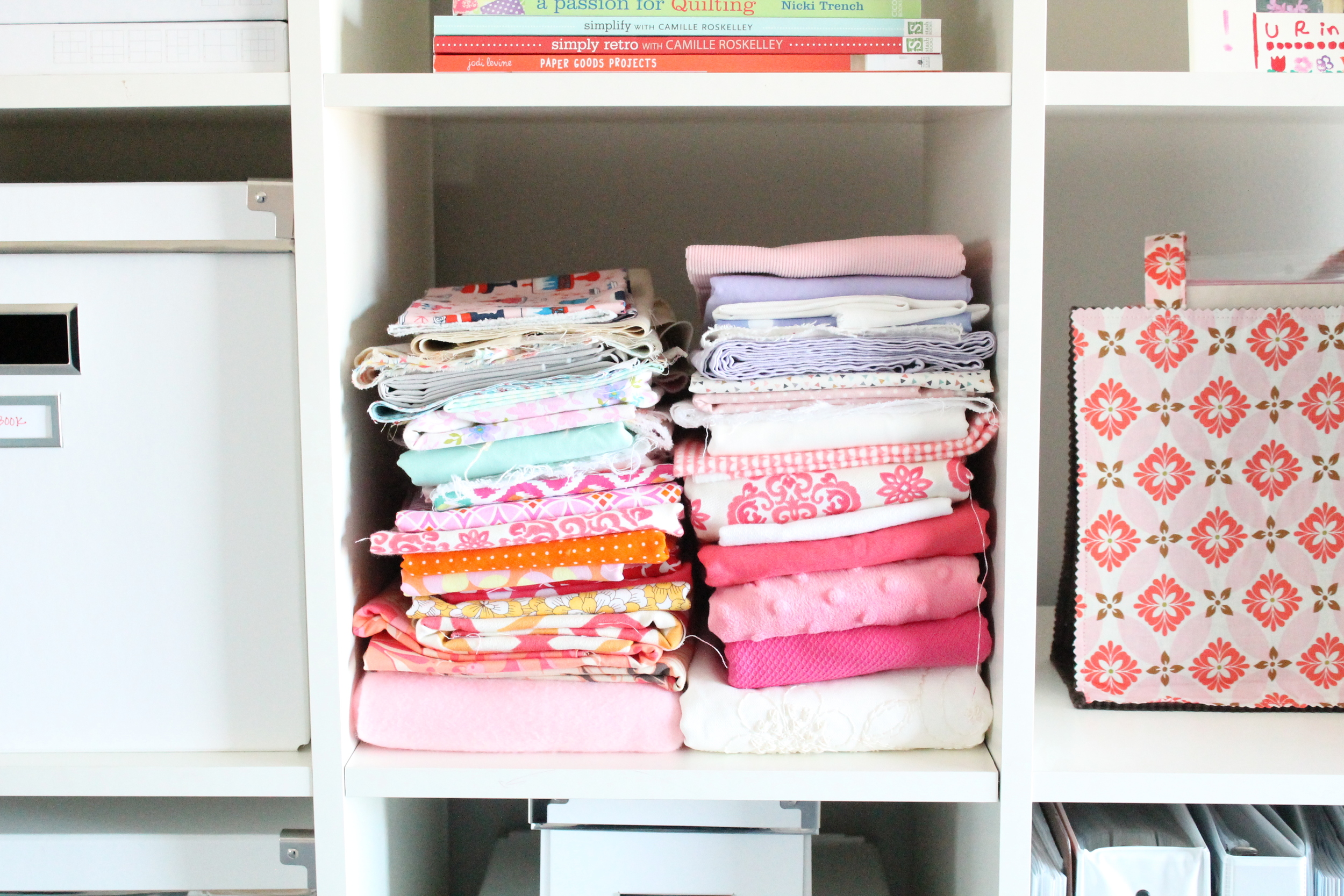 Fabric storage for craft room in Tessie Fay's family craft studio.