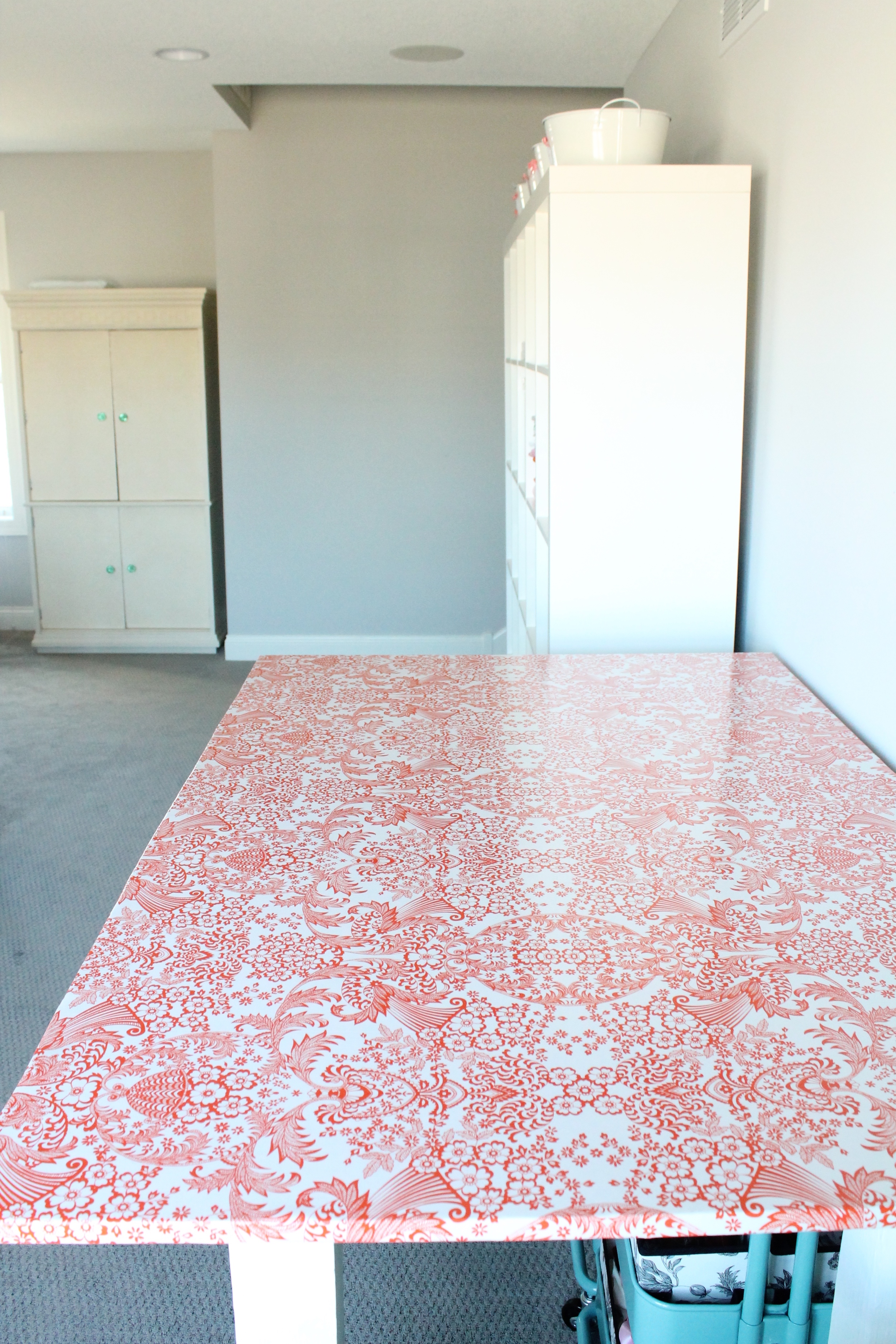 Oilcloth covered cutting table for craft room.