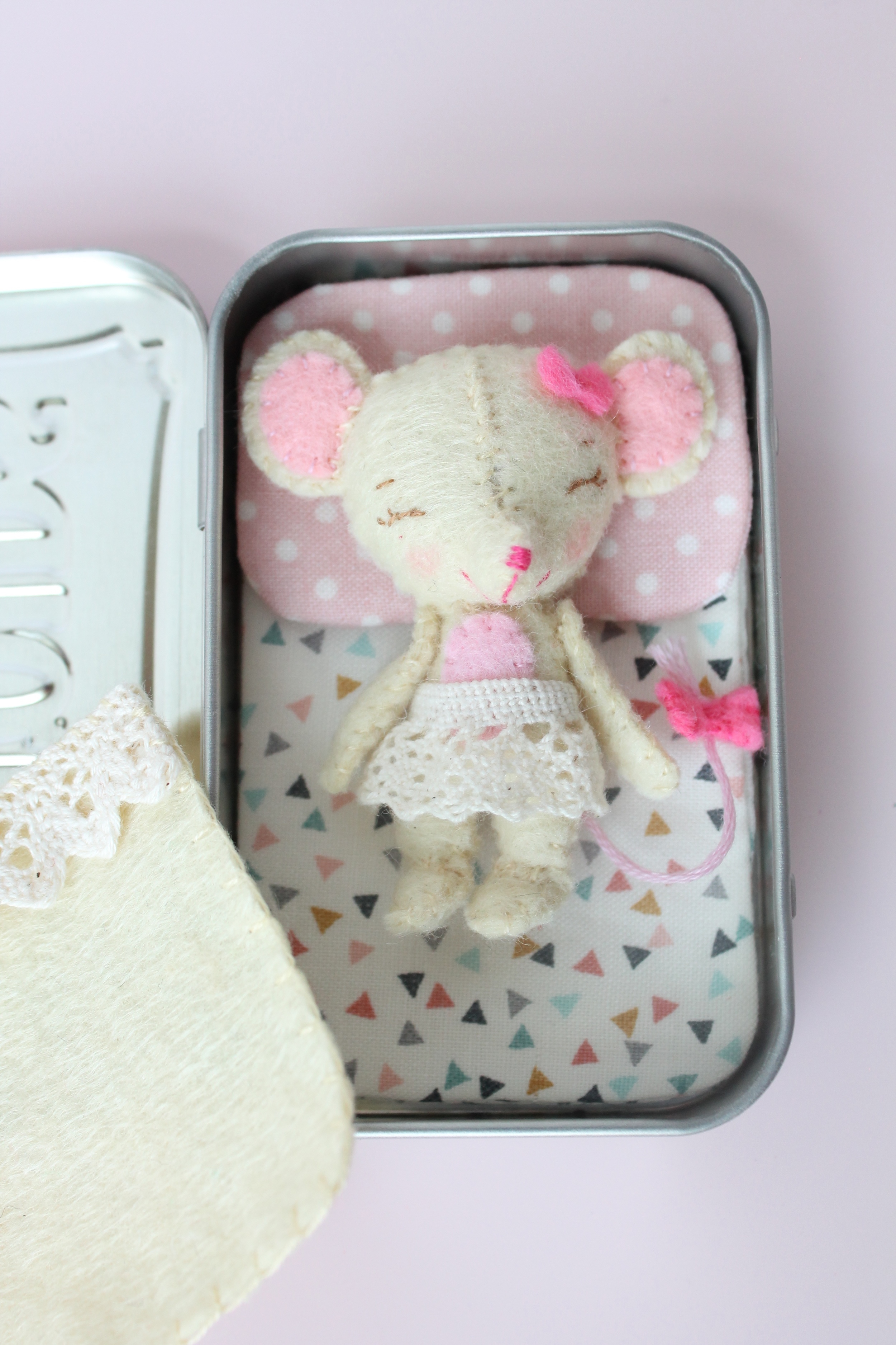 Little Mouse in a Tin. Hand sewn felt mouse with mattress pillow and blanket all inside a tin of Altoids.