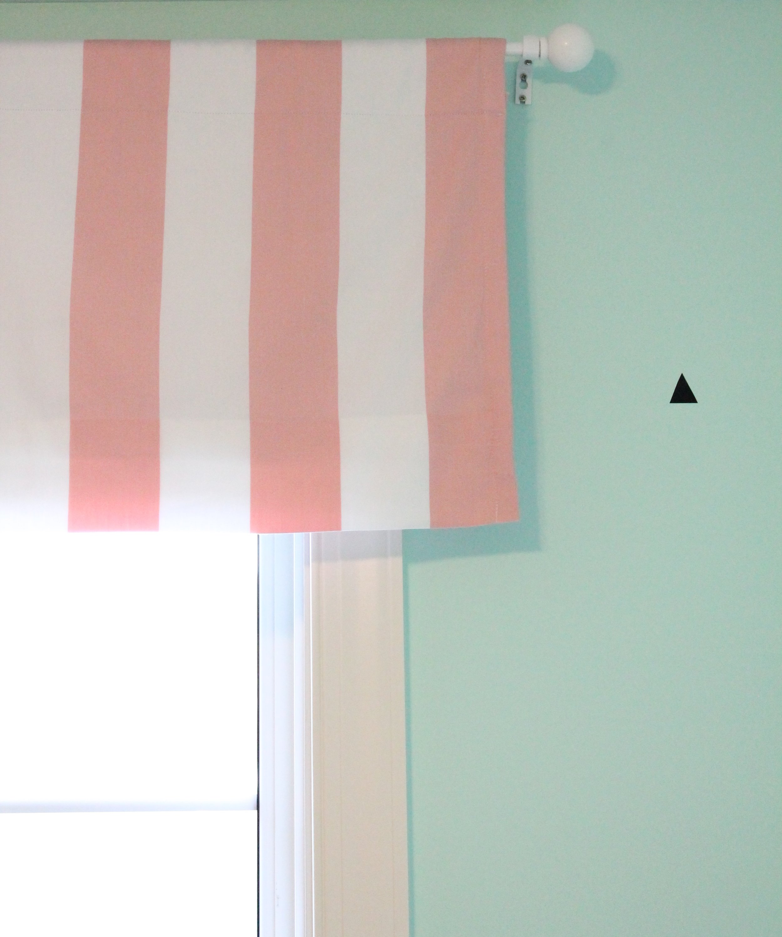 Pink and white striped valance.