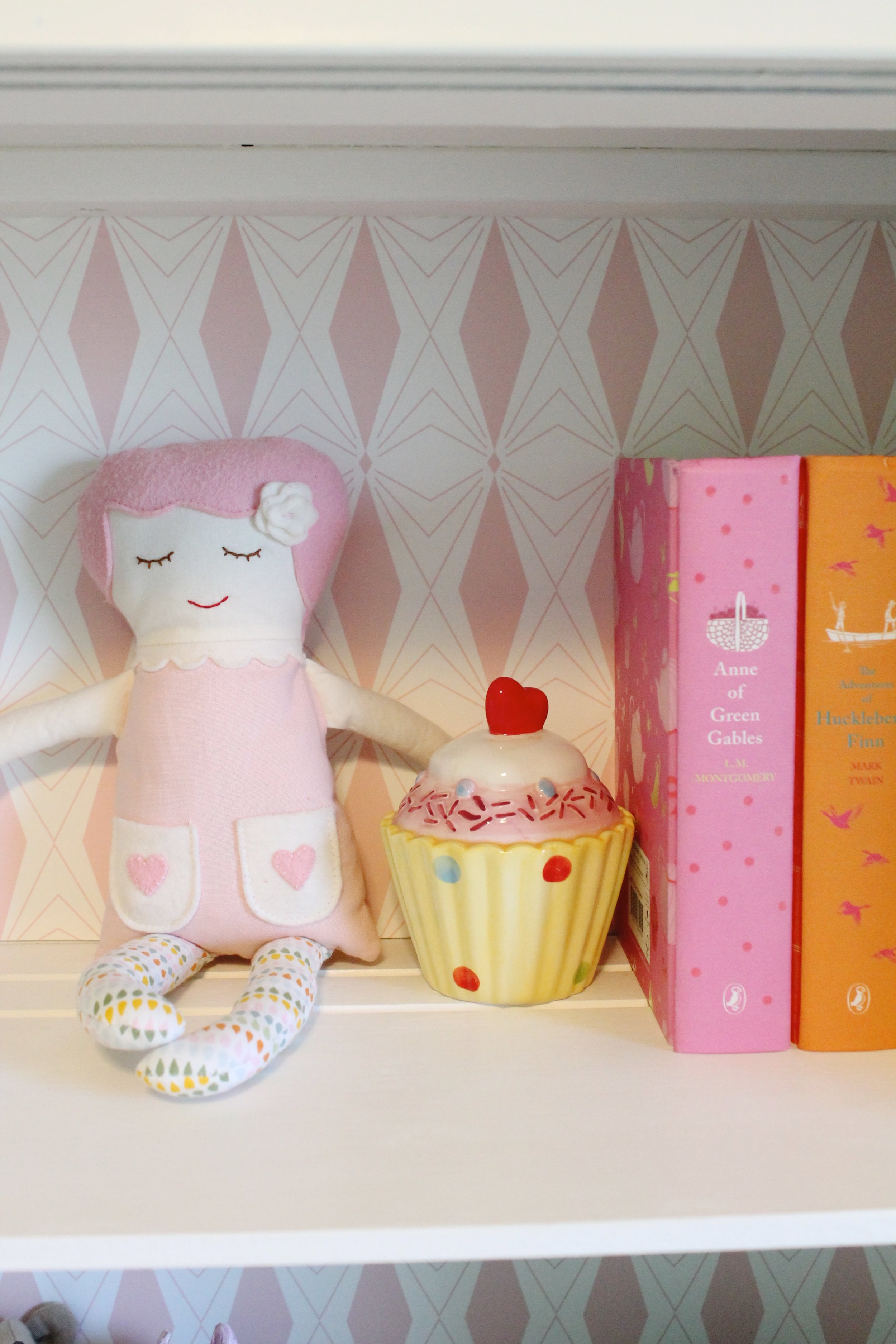 Black Apple Doll, Puffin Books and cupcake bank.