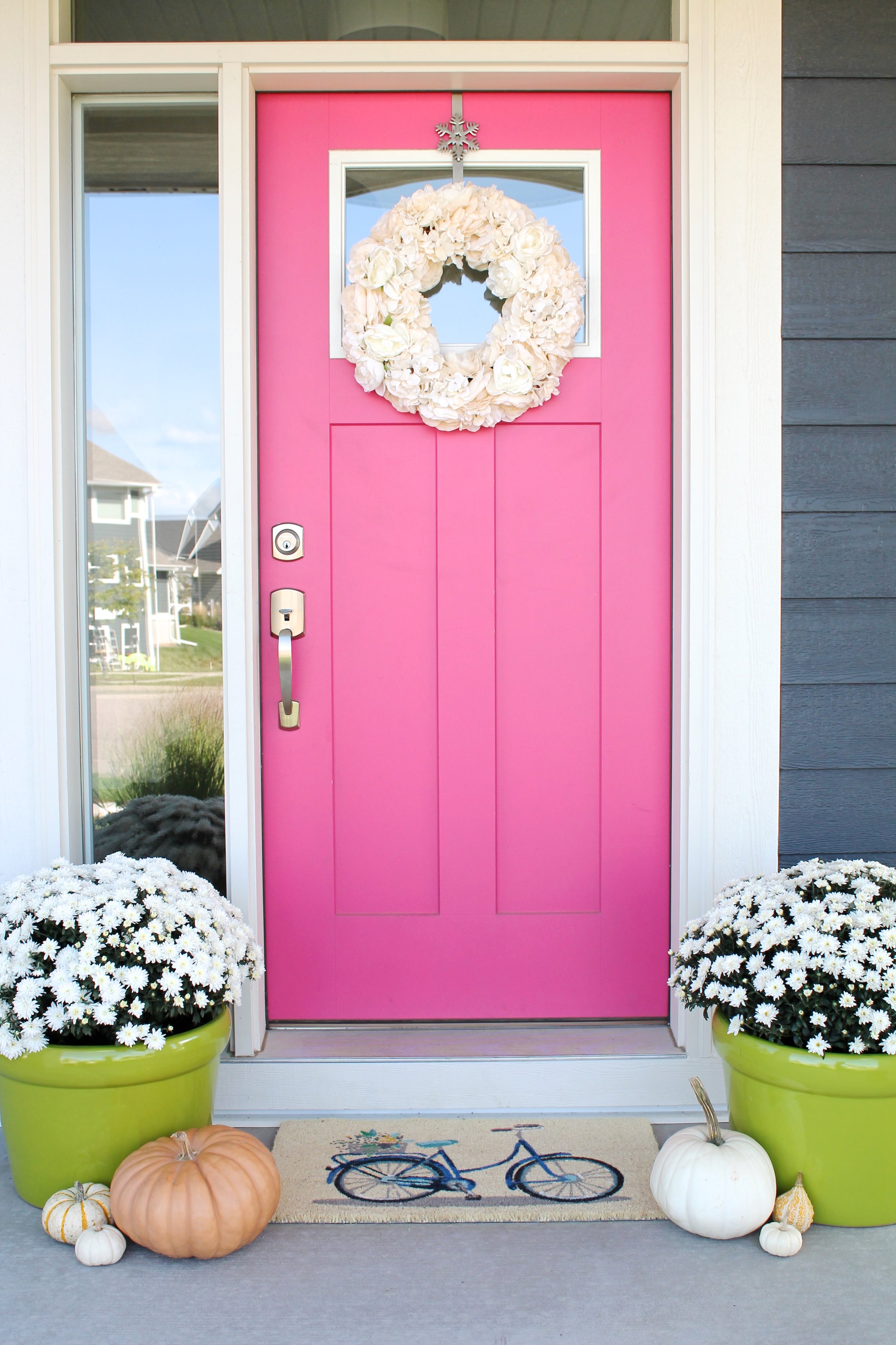 Pink Front Door. Color is Eros Pink by Sherwin Williams.